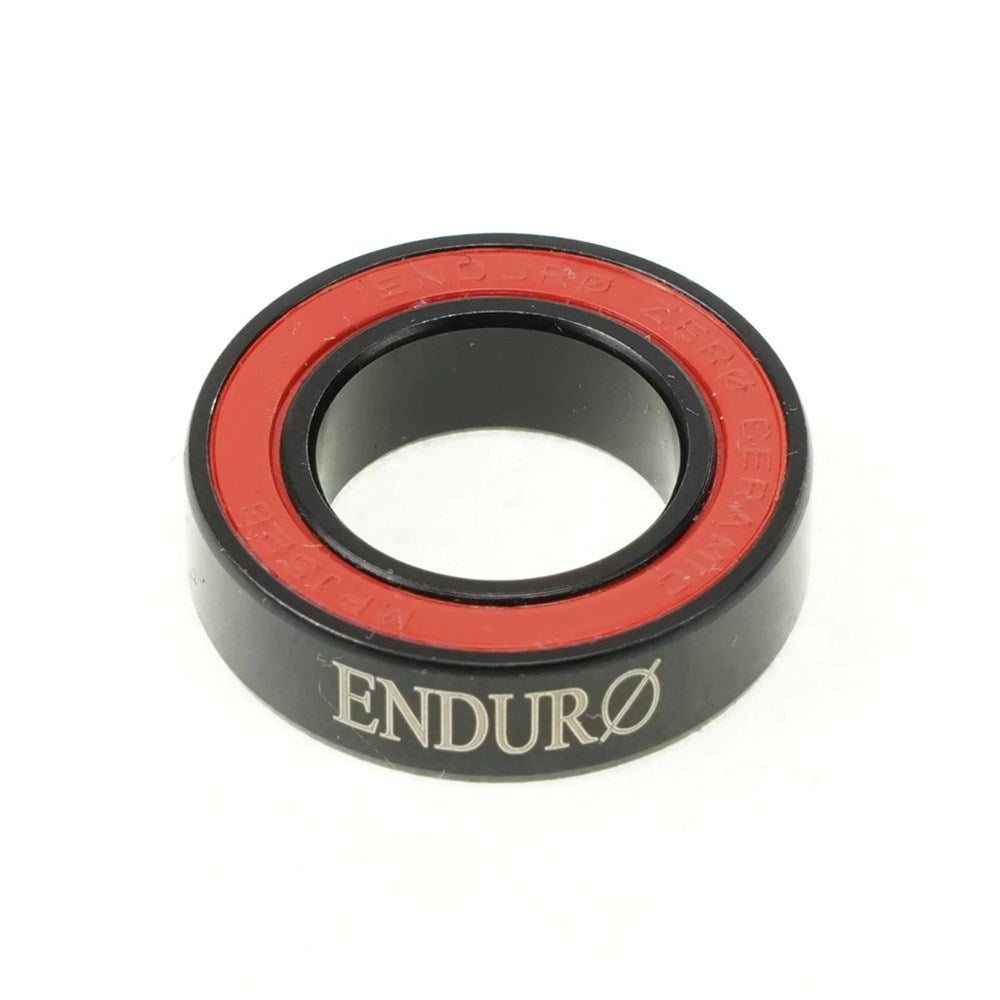 Black and red Enduro ZERO Ceramic Sealed Bearing with low rolling resistance on a white background.