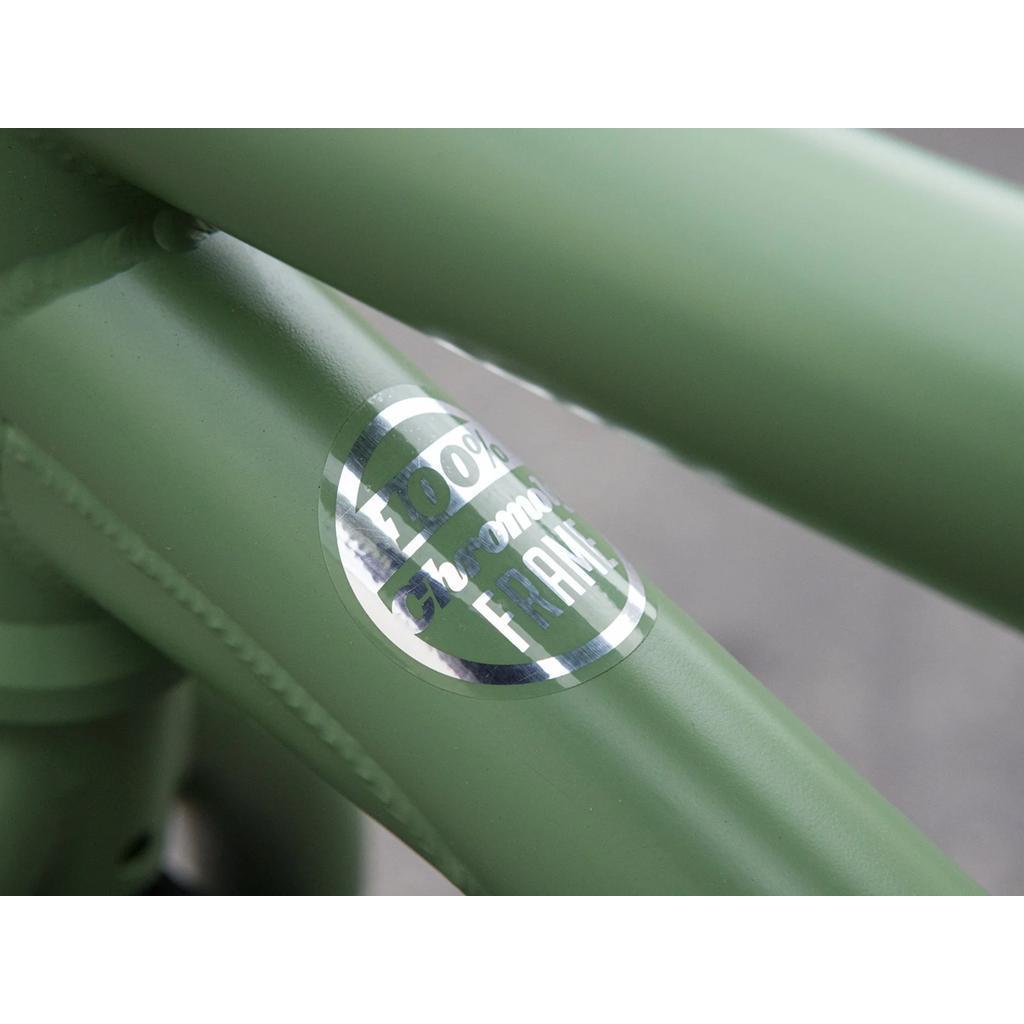 Close-up of the Sunday Forecaster 20 Inch Bike (2025) / Brett Silva in green, featuring a "100% Chromoly Frame" sticker that highlights its pro-level BMX construction.