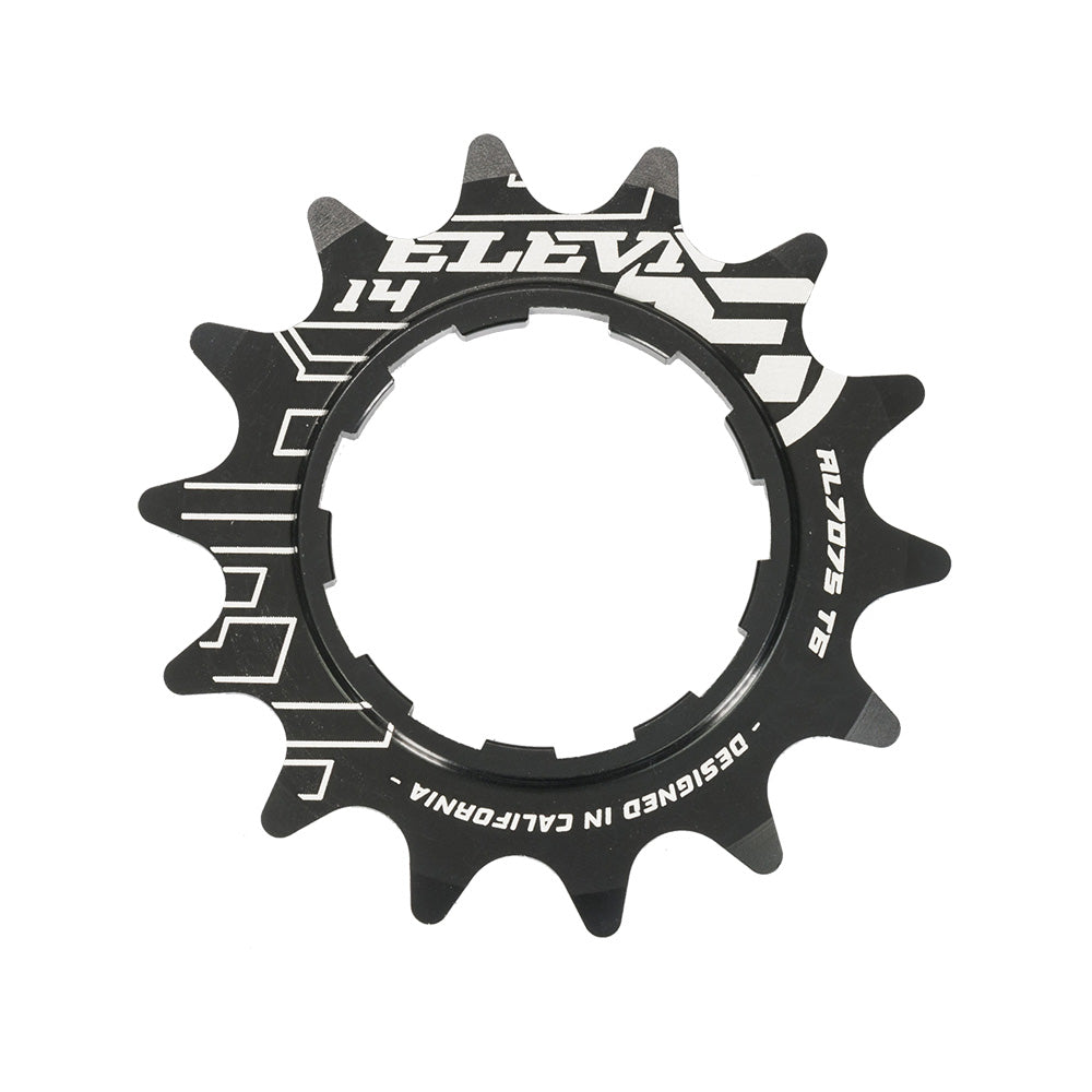 Black and white Elevn Alloy Cog 3/32 Shimano Comp with intricate cut-out details and CNC 7075 T6 Alloy inscriptions on the surface.