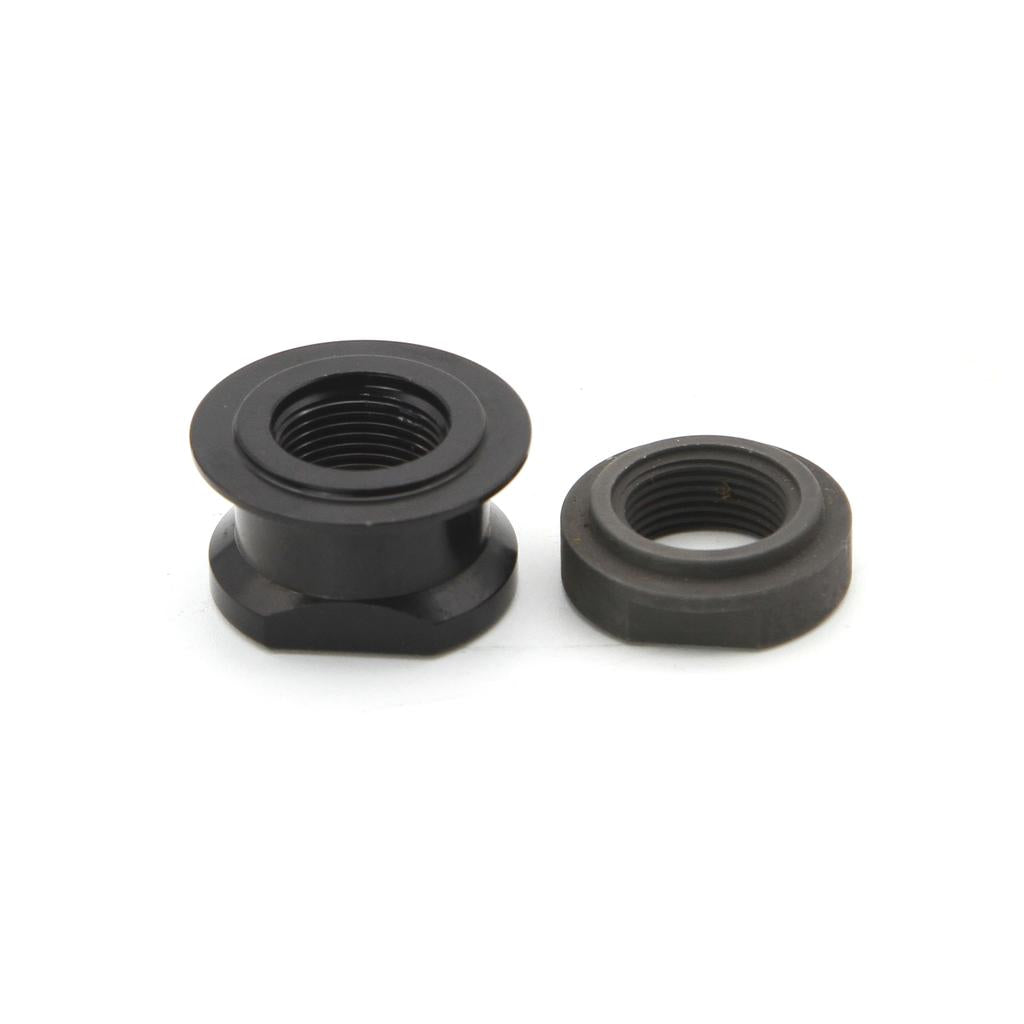 The Eclat Exile Cone Set, featuring two black metal hex nuts with flanged bases for rear hub replacement, is shown on a white background—one upright and one lying down.