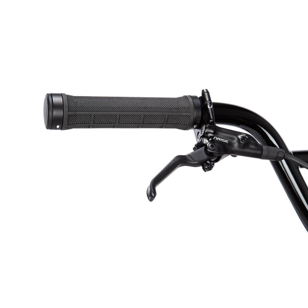Close-up of the black handlebar with a textured rubber grip and brake lever on the lightweight Radio Raceline Quartz Pro Disc 24 Inch Bike, designed with race-ready geometry.
