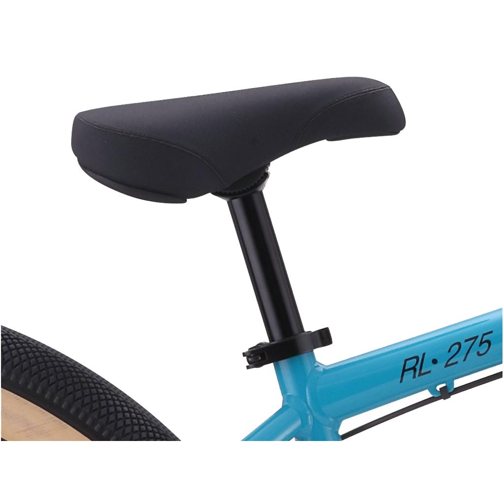 Close-up of a black bike seat and seat post on a blue Redline RL 275 27.5 Inch Bike retro BMX cruiser frame, with part of the rear tire visible.