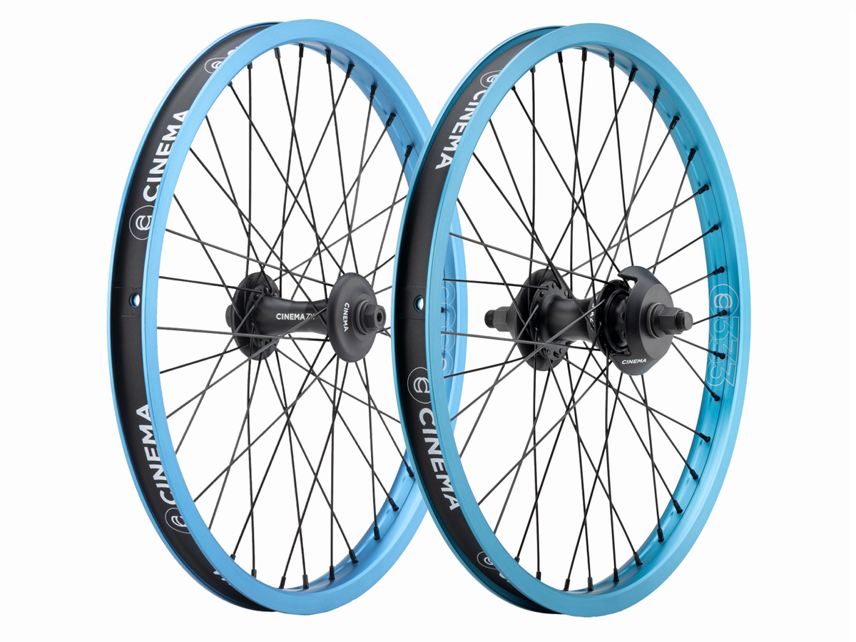 Cinema 333/ZX 20 Inch Wheel Set with light blue 20-inch rims, black spokes, and black hubs.