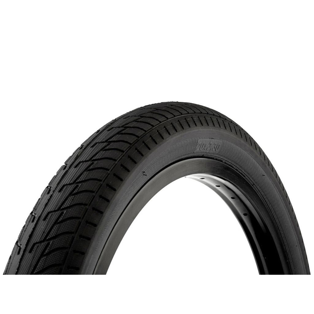 Close-up of a Fit FAF Tyre (Each) in black, featuring an all-round tread pattern, mounted on a rim against a white background.