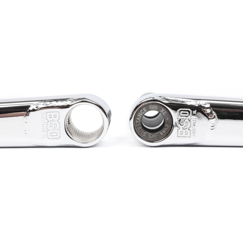 Two BSD Substance XL V2 Cranks, chrome metal with a 24mm hollow spindle interface and embossed “BSD Substance” branding, are displayed end-to-end on a white background.