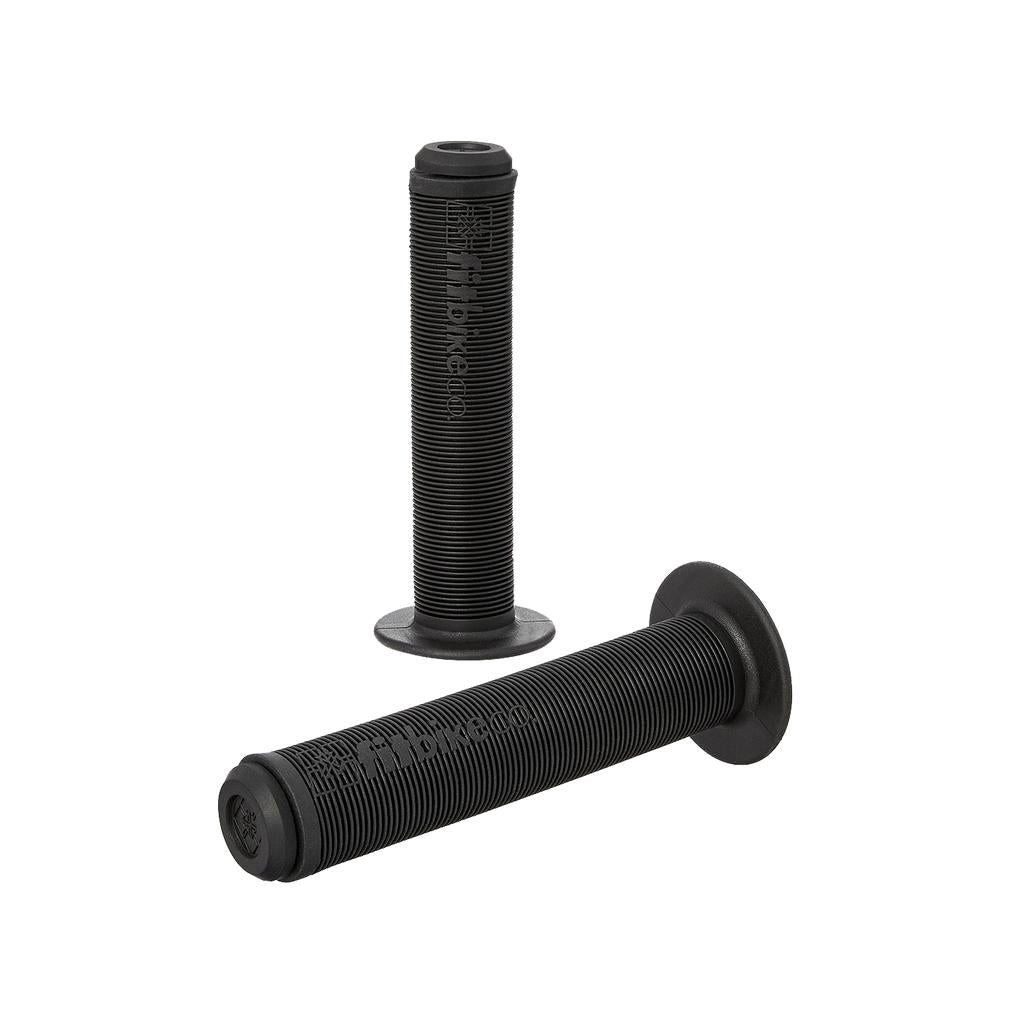 A pair of Fit Bike Co OG Grips in black rubber, featuring a mushroom-finned surface and flanged ends, styled after the classic BMX grip design.