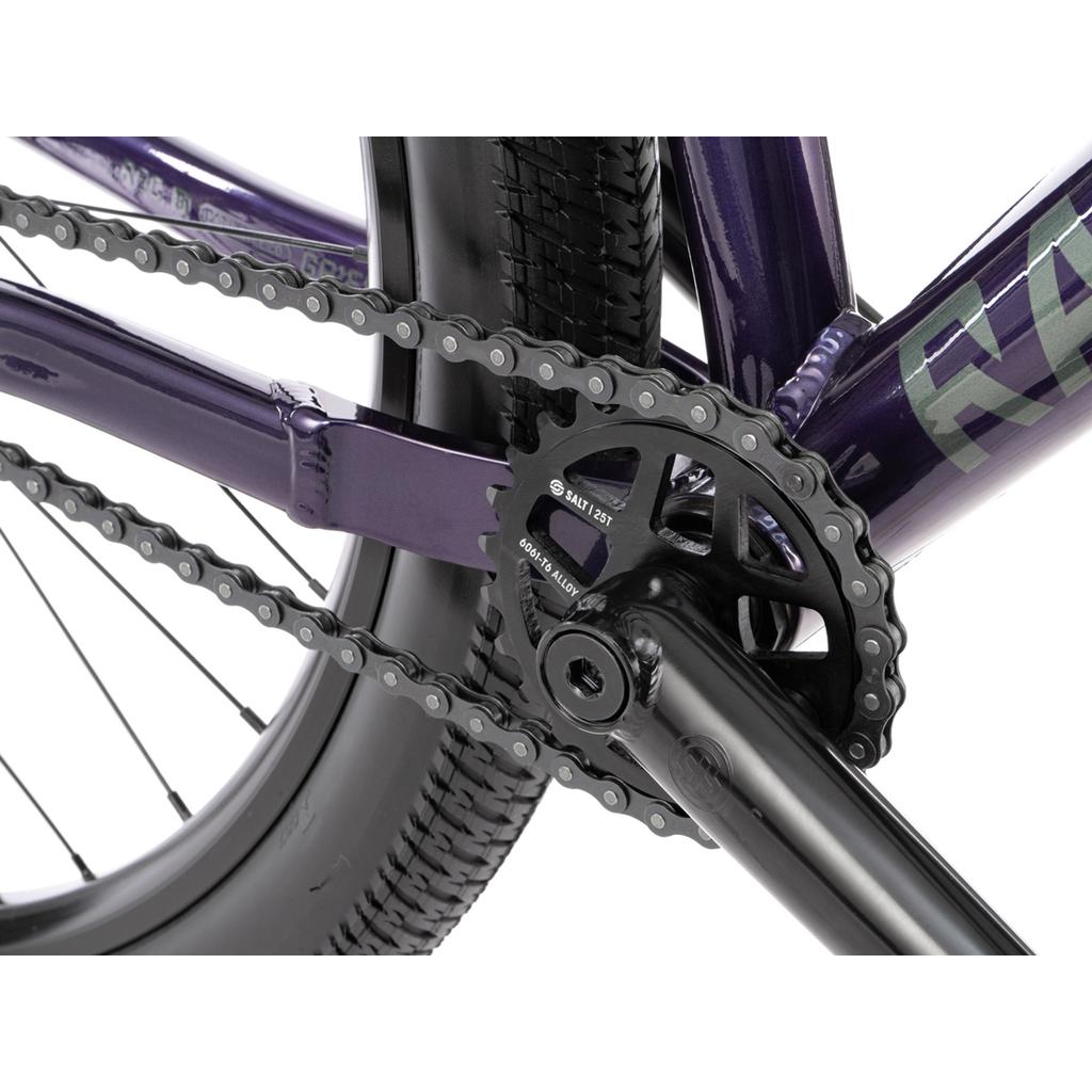 Close-up view of the Radio Griffin 26 Inch Bike’s rear wheel, crankset, and chainring, featuring a purple frame and black Maxxis DTH Tyres.