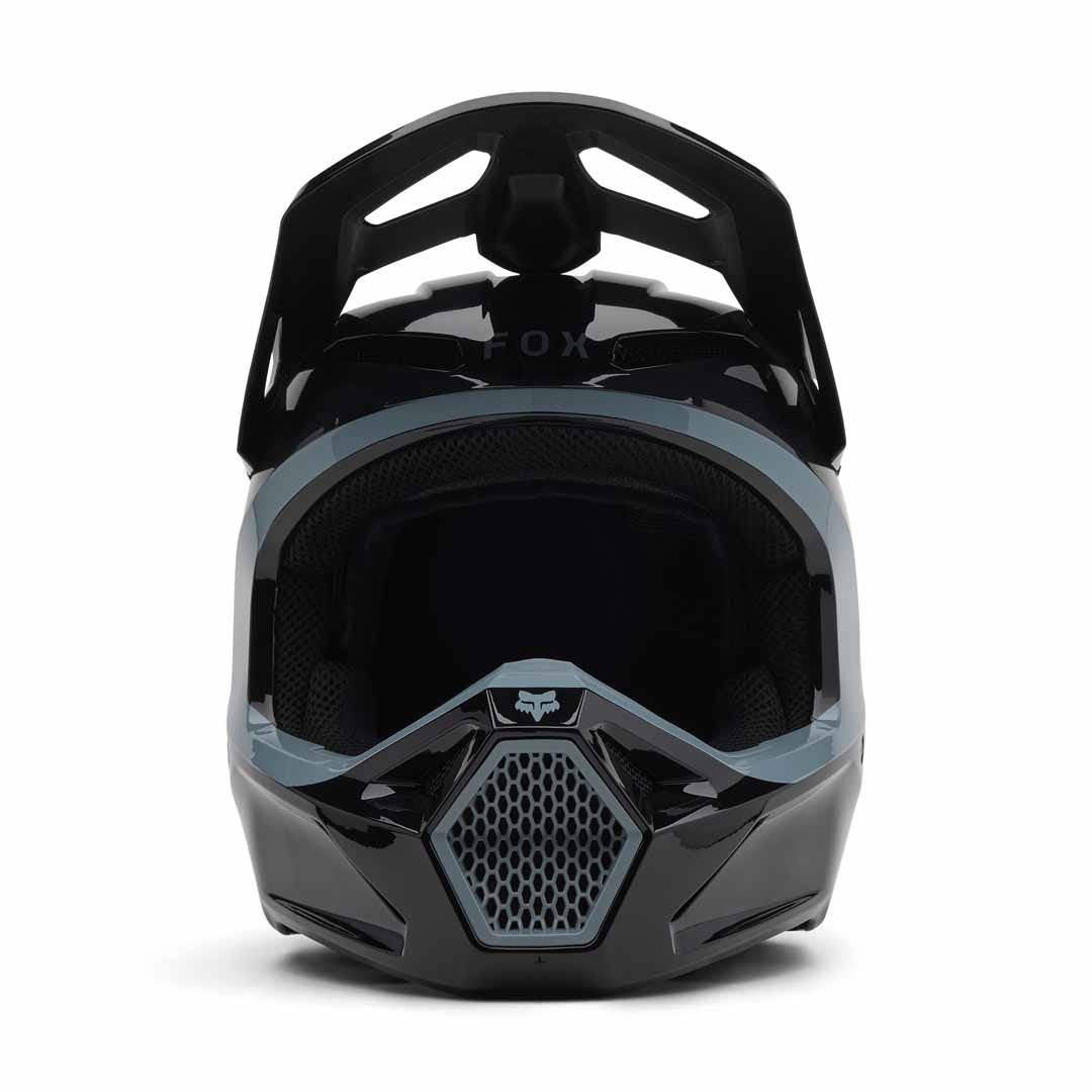 Front view of the Fox YTH V1 Taunt Helmet in black and gray, featuring a visor and mesh chin guard ventilation—an ideal entry-level youth BMX helmet.