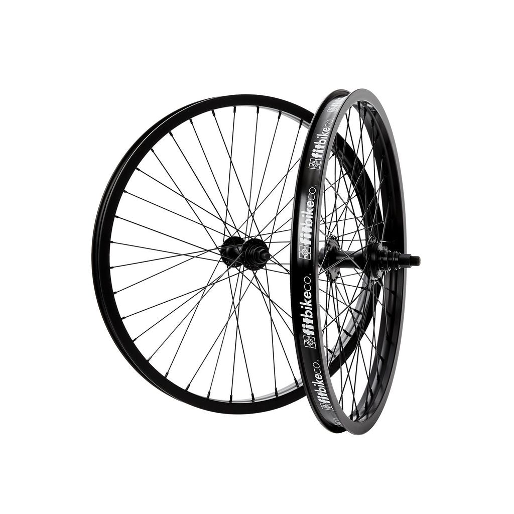 Two Fit Bike Co 24 Inch Cassette Wheel Sets with black FIT Double Wall OEM rims and spokes isolated on a white background.