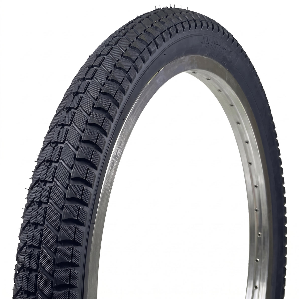 S&M Mainline V2 20 Inch Tyre featuring a blocky, directional tread pattern mounted on a metallic rim.