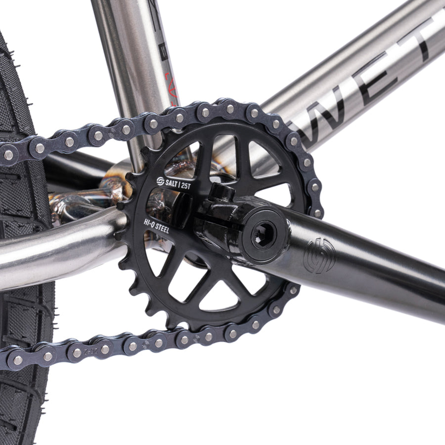 A close up of the chain on a Wethepeople Nova 20 Inch BMX Bike.