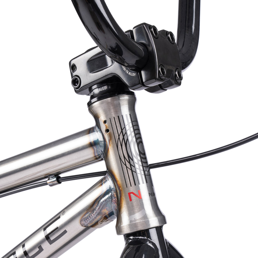A close up of a Wethepeople Nova 20 Inch BMX Bike with handlebars.