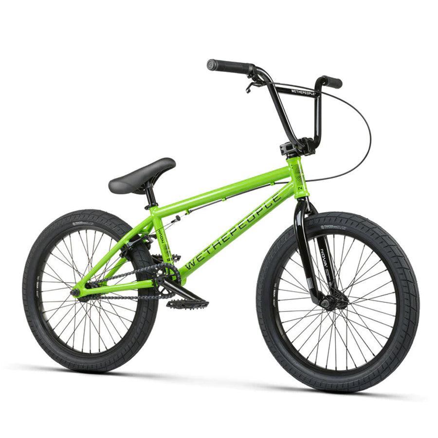 A green Wethepeople Nova 20 Inch BMX bike on a white background.