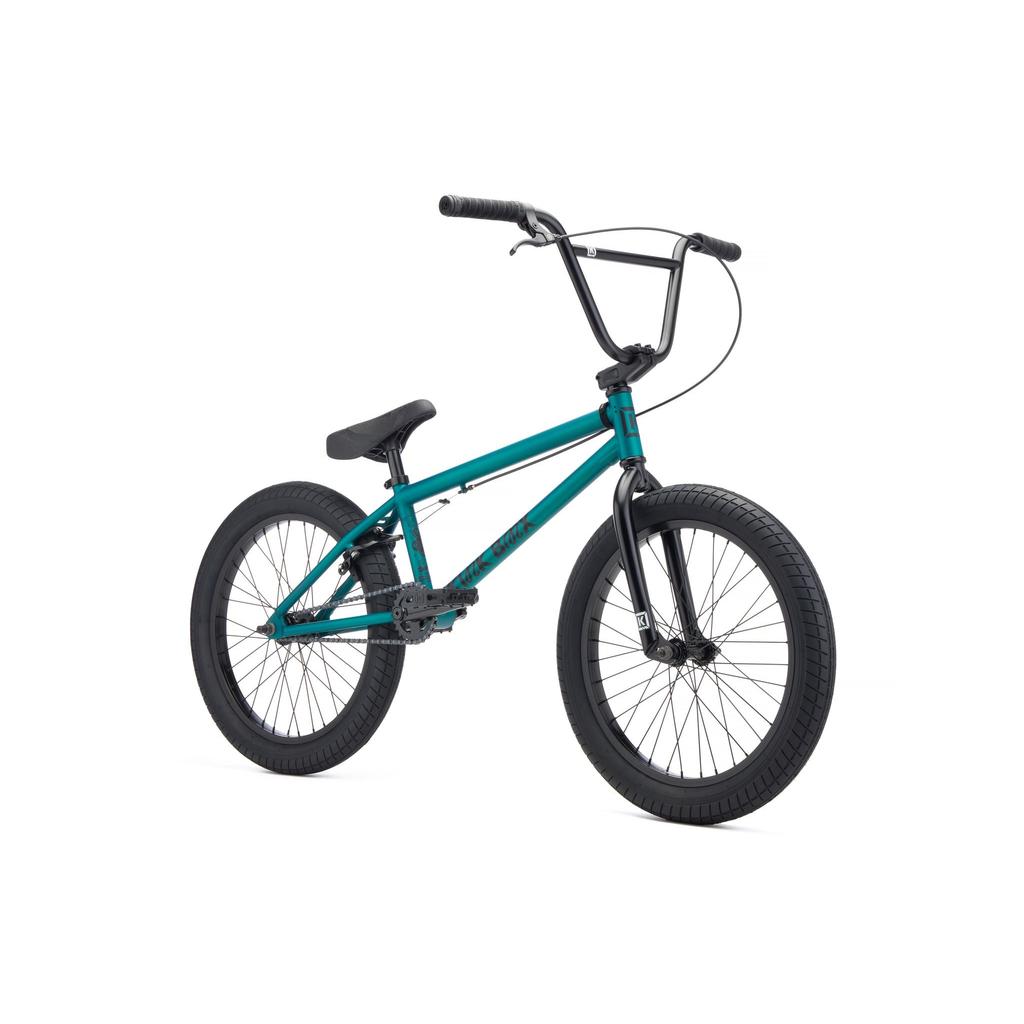 The Kink Curb 20 Inch Bike (2027) is a teal BMX for beginners with black handlebars, seat, pedals, and tires, plus reliable Mission parts, displayed on a white background.