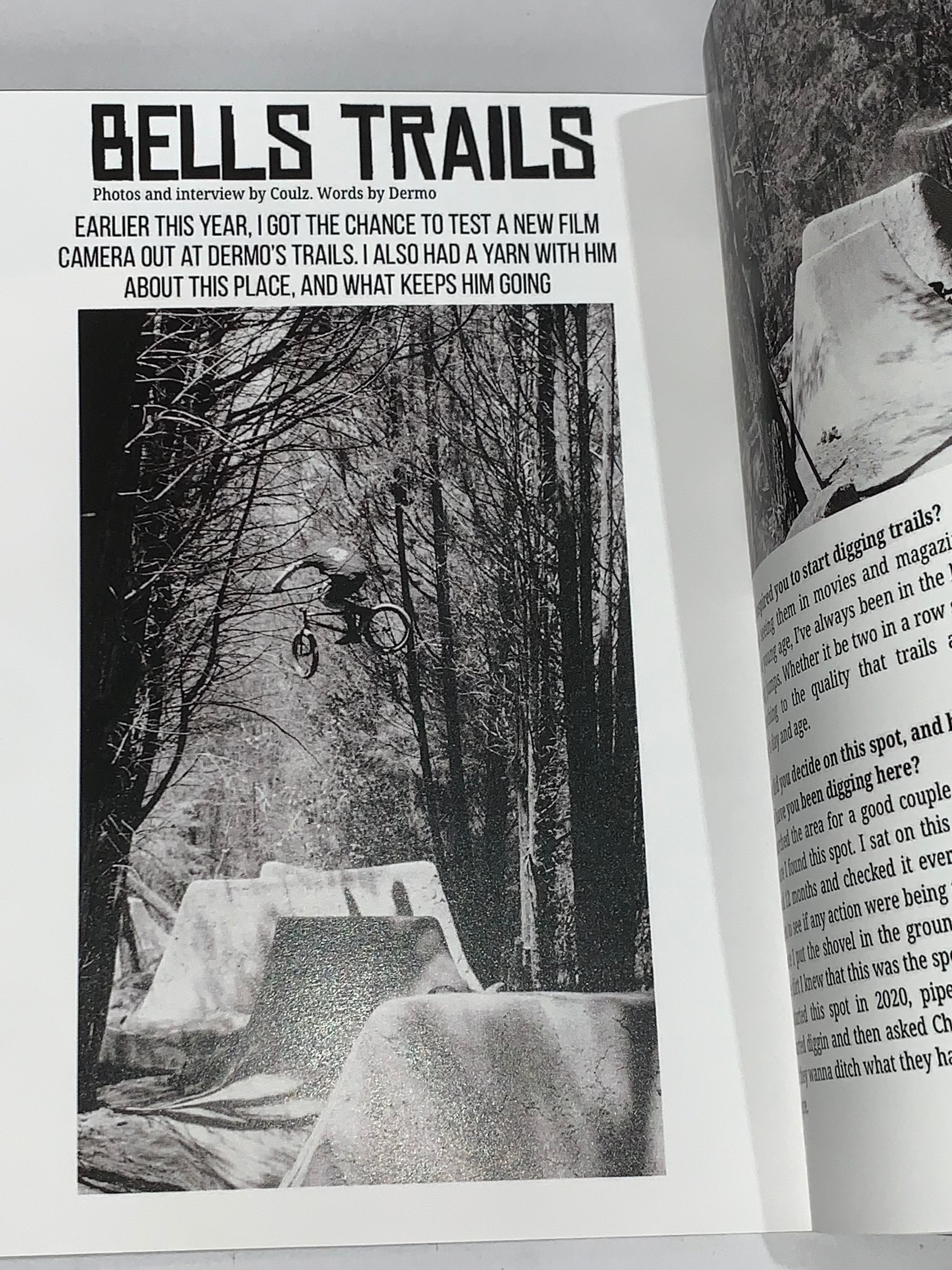 Black and white photo of a BMX rider jumping on a forest dirt trail appears in Jerk Zine Volume 1, alongside an article titled "BELLS TRAILS.
