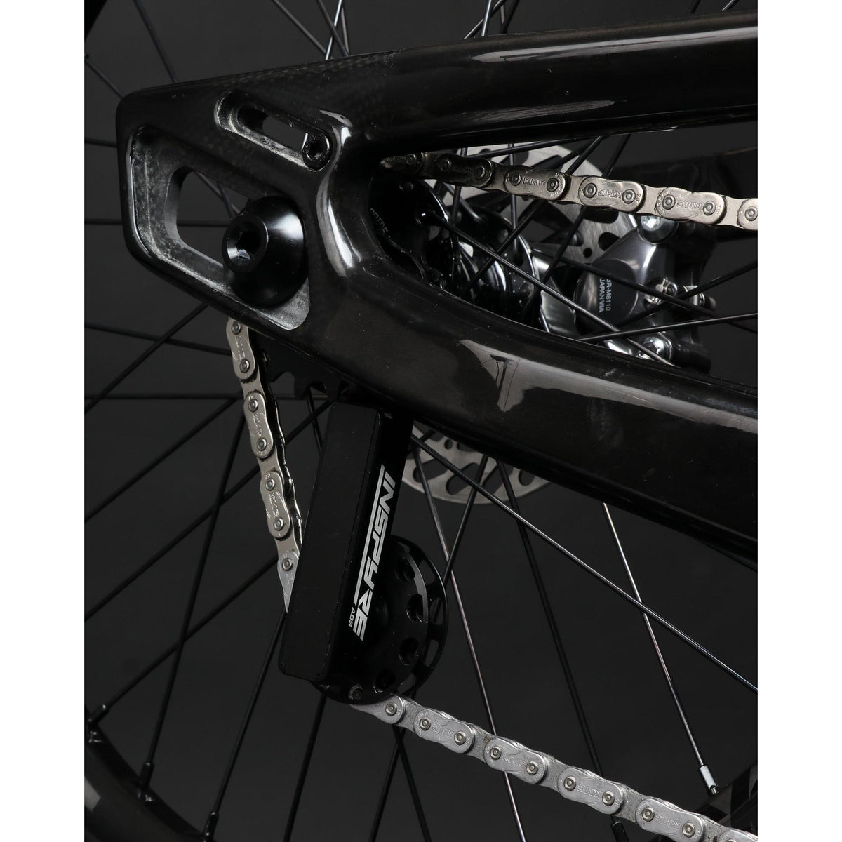 Inspyre Concorde V3 ADS Tensioner mounted to a sliding dropout on a bike frame.