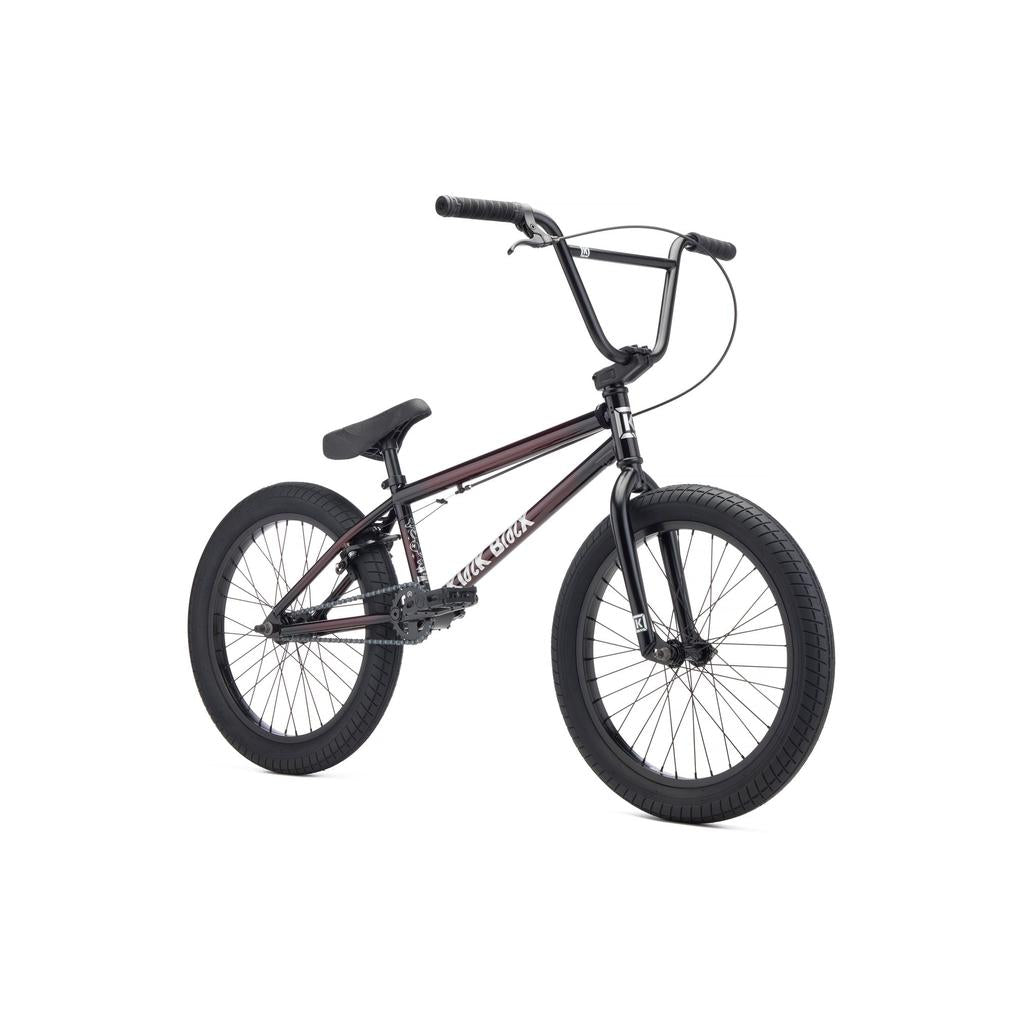 The Kink Curb 20 Inch Bike (2027), a black beginner BMX with Mission parts, thick tires, a padded seat, and high handlebars, is displayed on a plain white background.