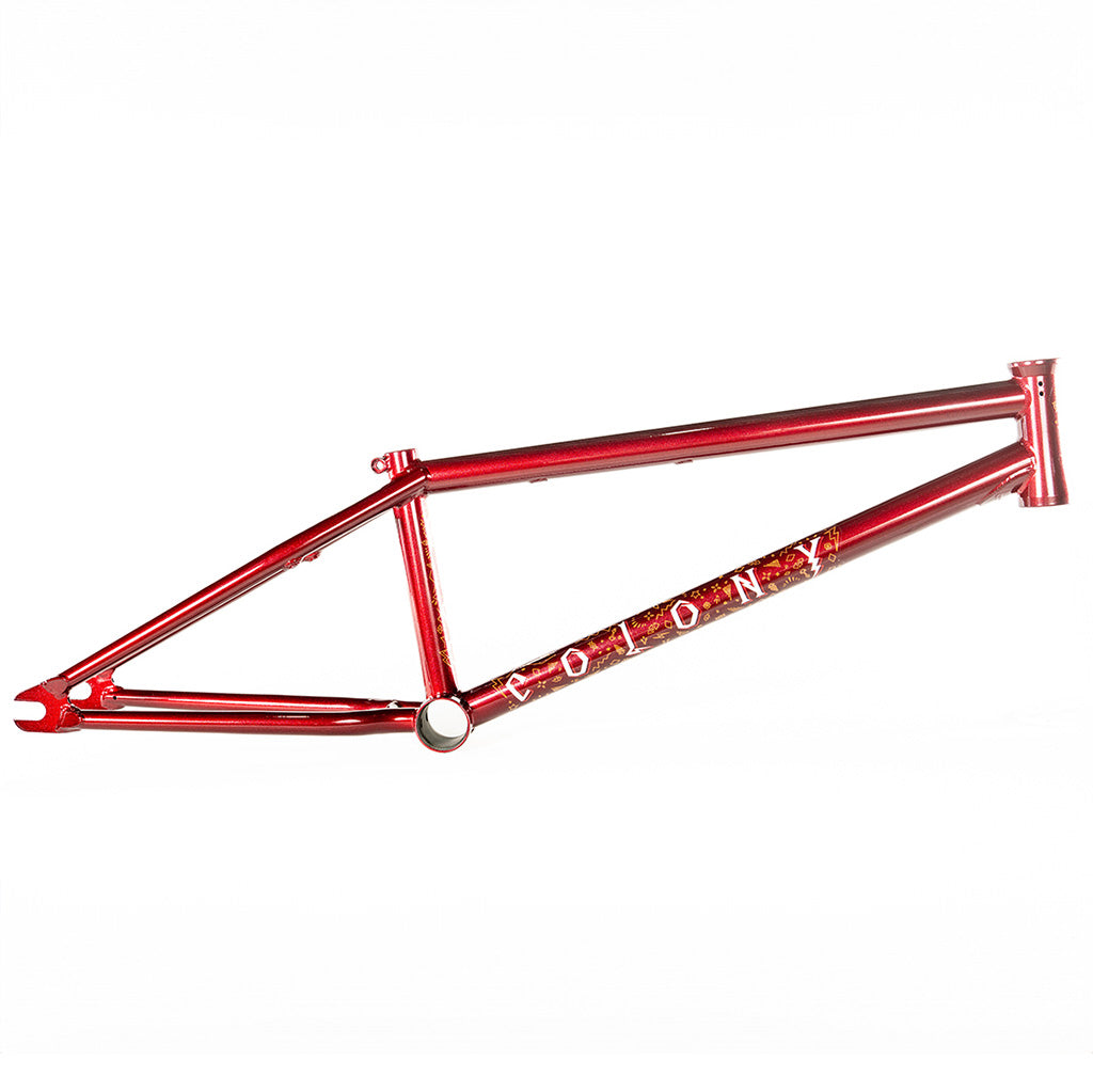 The Colony Rico 'Lite' Frame, designed by Paterico Fallico, is a technical wizard. With its vibrant red color, the Colony Rico 'Lite' Frame stands out against the clean white background.