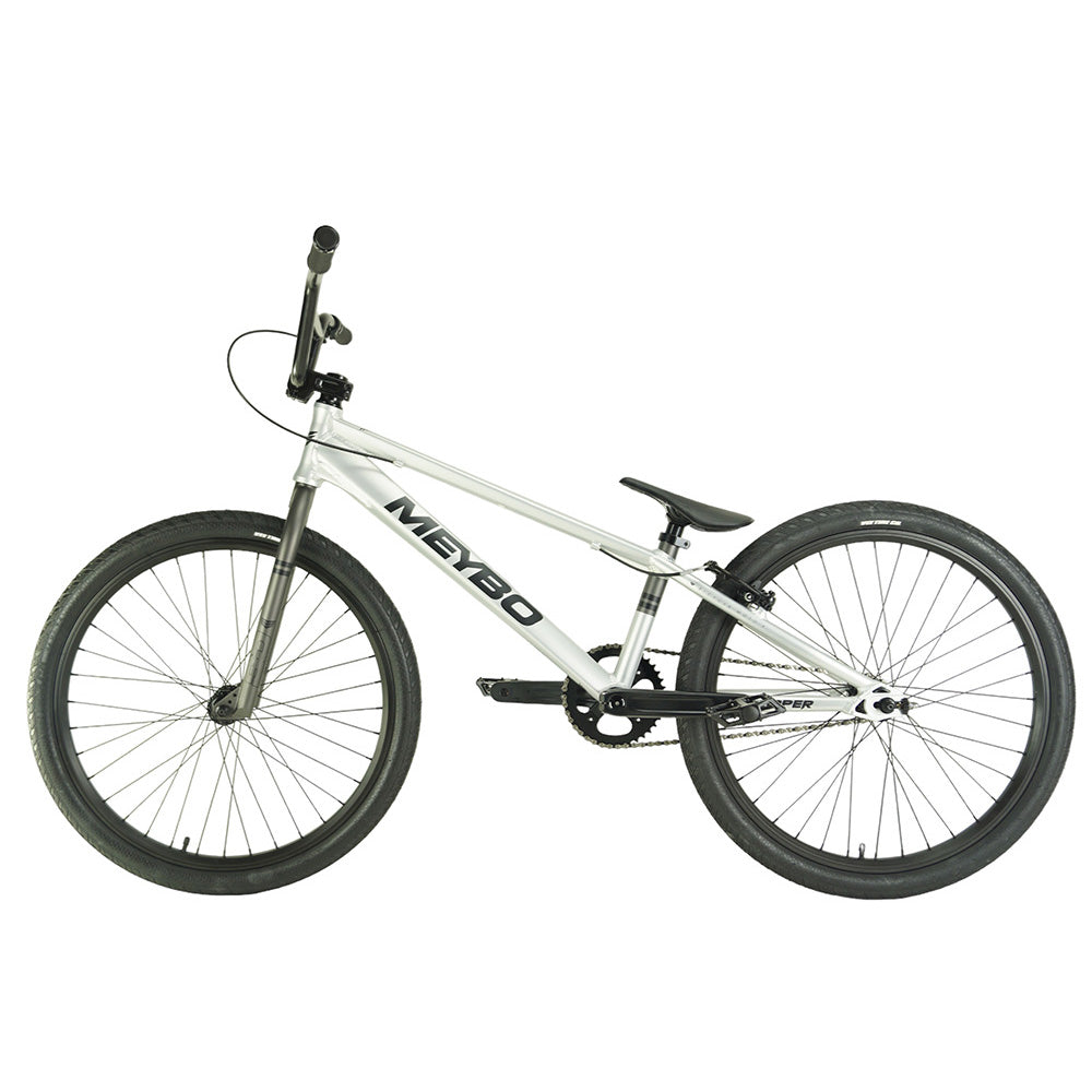 A white Meybo 2024 Clipper Pro Cruiser Bike with hydraulic disc brakes on a white background.