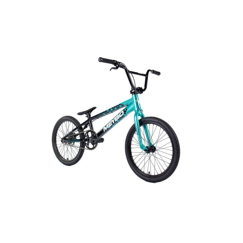 The Meybo 2026 Clipper Pro XL Bike, featuring a teal and black frame, black handlebars, and thick tires, is photographed on a white background.