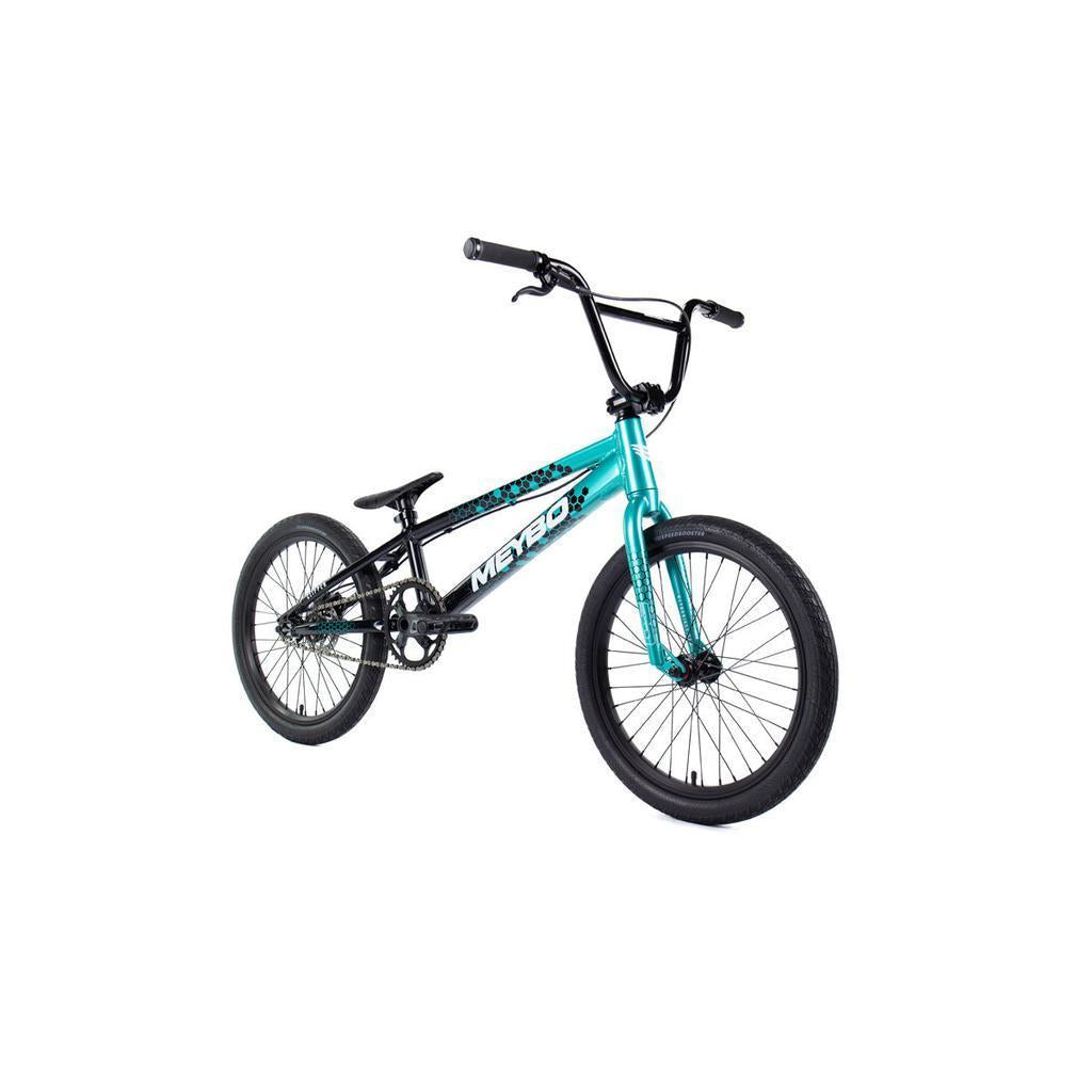 The Meybo 2026 Clipper Pro XXL Bike is shown in teal with black handlebars, seat, and tires on a white background—ideal as an entry-level BMX race bike for beginners.