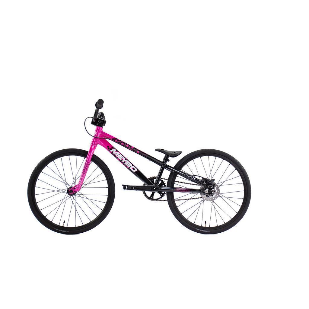 The Meybo 2026 Clipper Mini Bike is a BMX race bike featuring a black and pink frame, black wheels, and a single gear—ideal for entry-level racers.