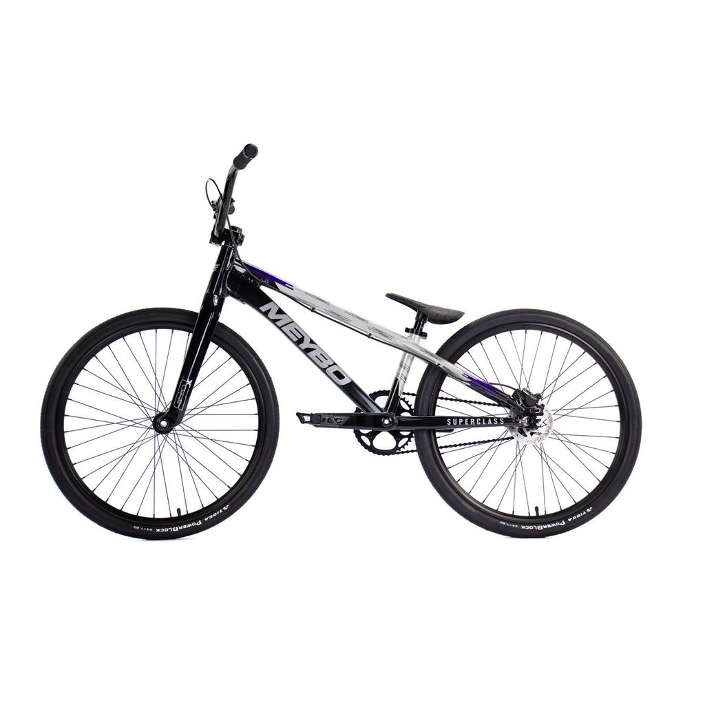Side view of the Meybo 2026 Superclass Pro Cruiser Bike in black and silver, featuring a 22-inch top tube, thin tires, straight handlebar, and compact frame—perfect for tall BMX riders—set against a white background.