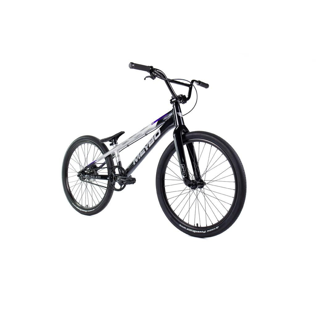 A black and silver Meybo 2026 Superclass Pro XL Cruiser Bike with large tires, straight handlebars, and a lightweight frame for tall riders, shown on a white background.
