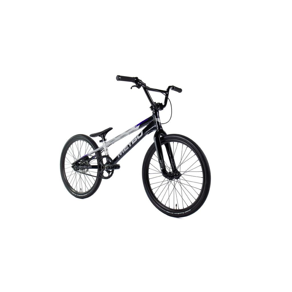 The Meybo 2026 Superclass Expert XL Bike is a black and silver BMX racing bike with a lightweight frame, knobby tires, and straight handlebars for tall riders, shown on a white background.