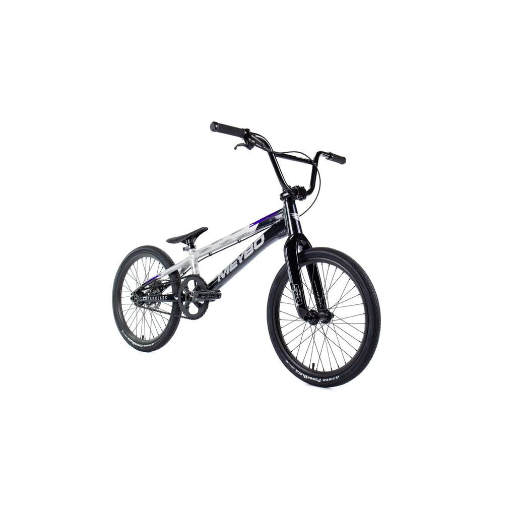 The Meybo 2026 Superclass Pro XL Bike is a silver and black BMX racing bike with a compact frame, thick tires, and black handlebars, shown against a plain white background—ideal for tall riders.