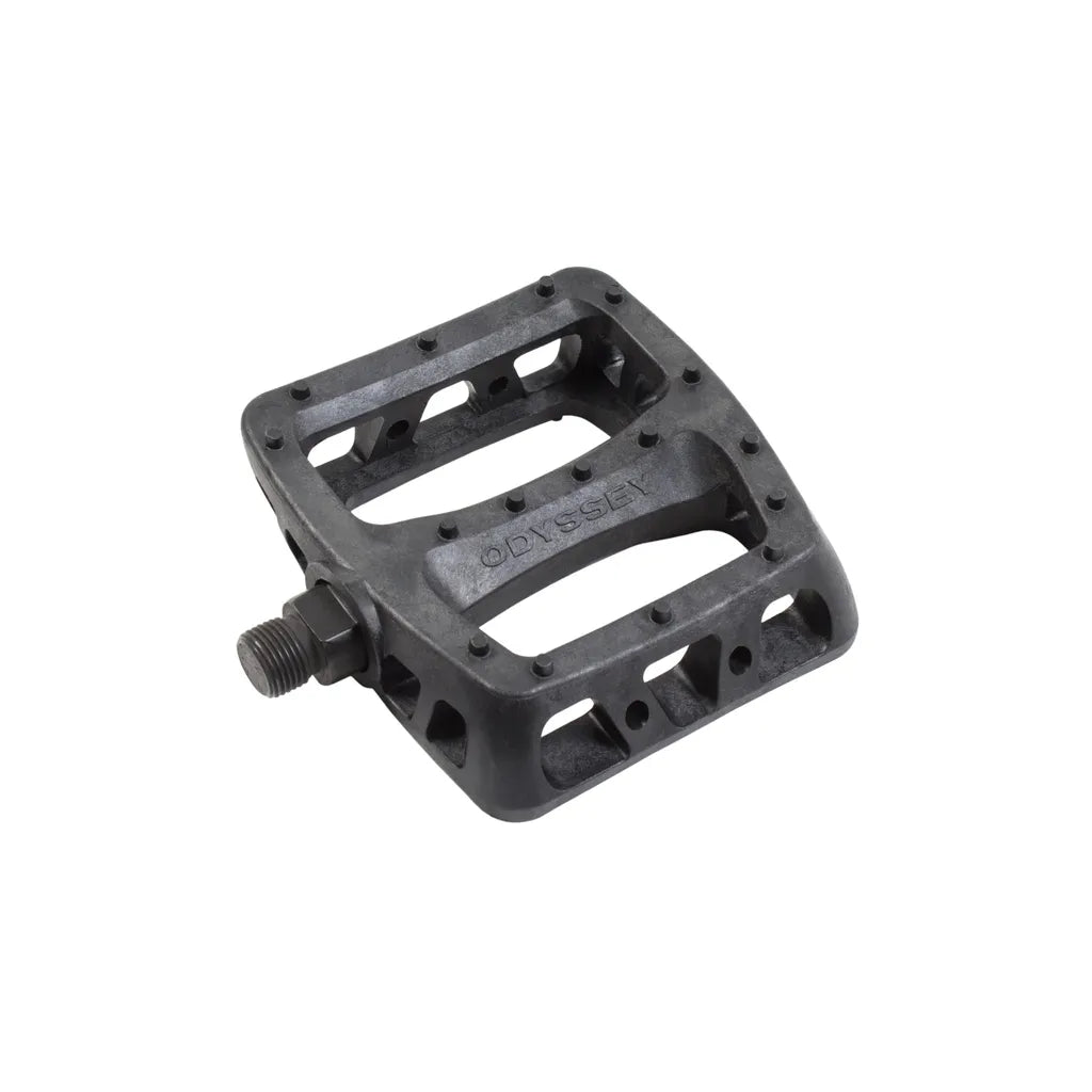 The Odyssey Twisted PC 1/2in Pedals are black, rectangular pedals with a textured, cutout design for grip—ideal for one-piece cranks and inspired by the original Twisted PC model.