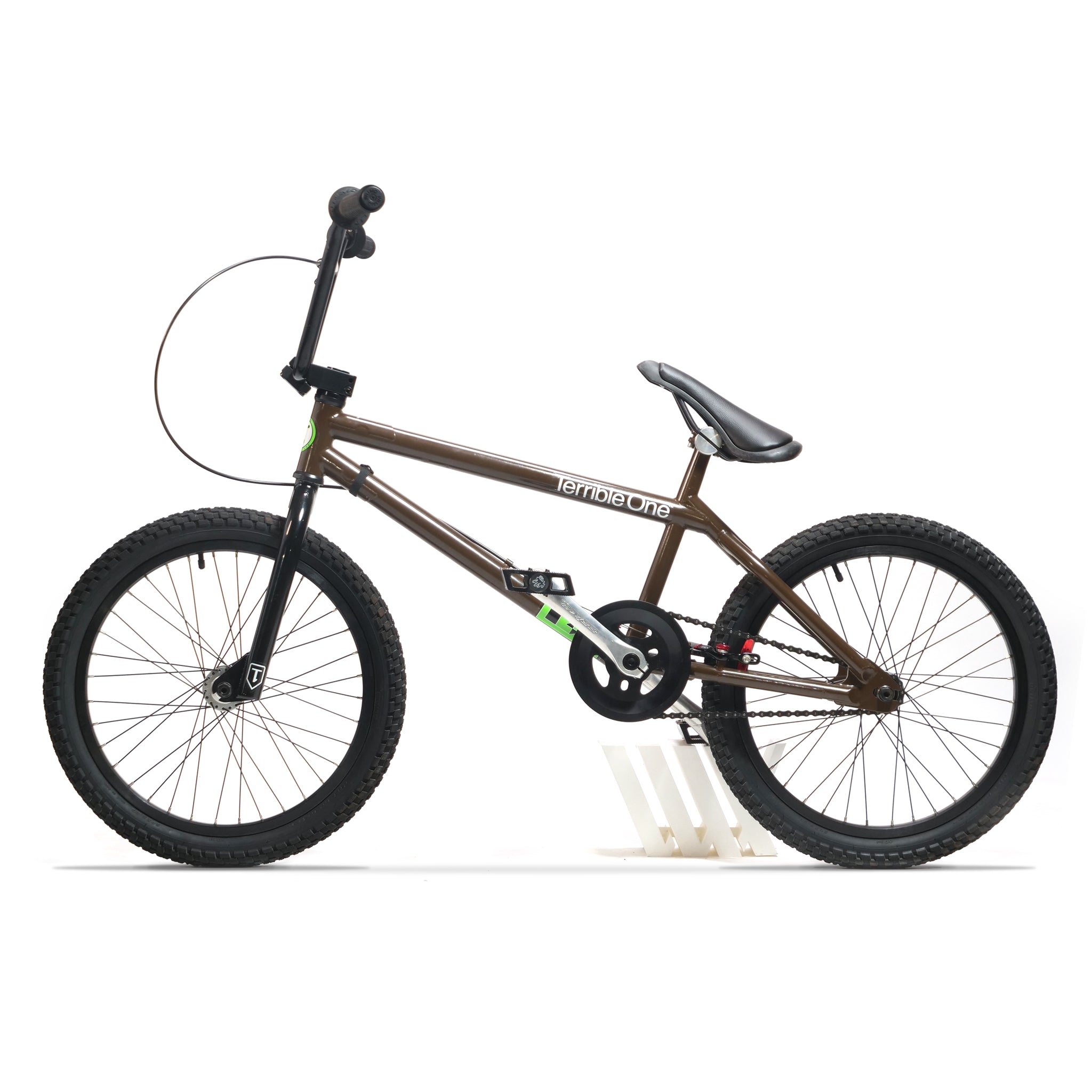 A 2003 Terrible One Barcode Garrett Byrnes Custom 20 Inch Bike in brown, featuring black handlebars, tires, and seat, is displayed in profile against a white background.