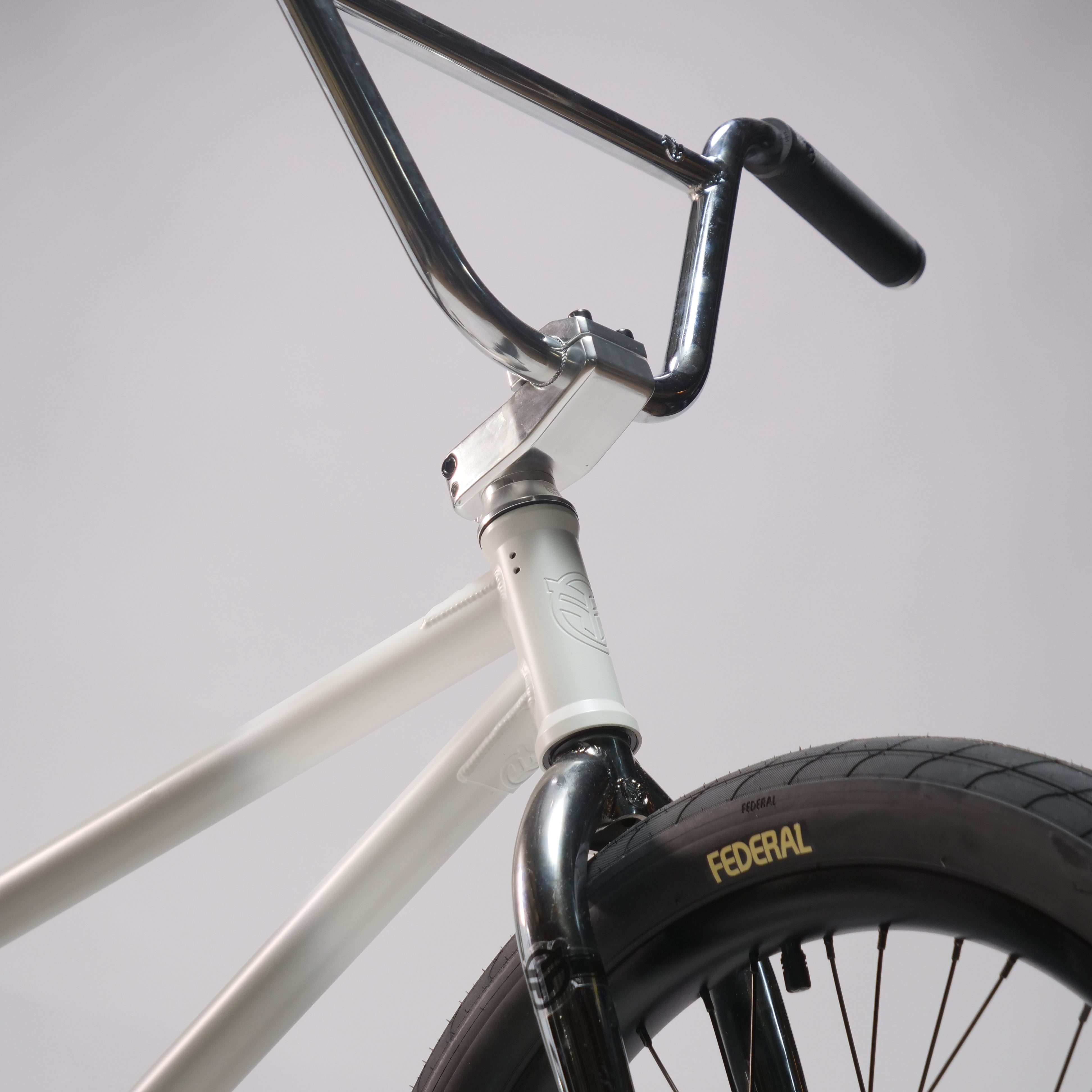 Close-up of the Federal Lacey x Chrome Custom 20 Inch Bike, highlighting quality Federal BMX components like handlebars, stem, tire with "FEDERAL" logo, and premium Assault 22 Forks.