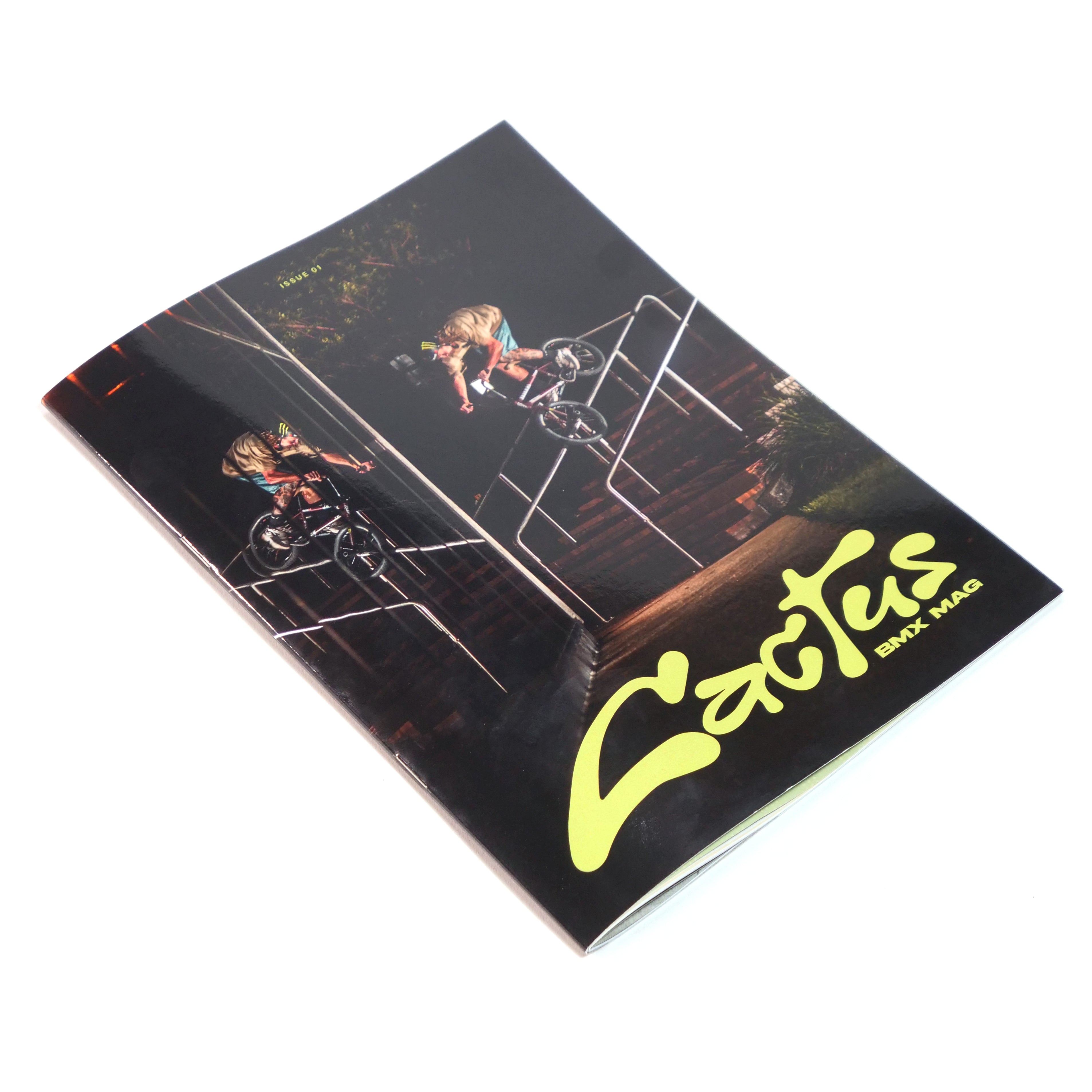 Cactus BMX Mag - Issue 1 is shown on a white background, featuring a cyclist performing a staircase trick on the cover.