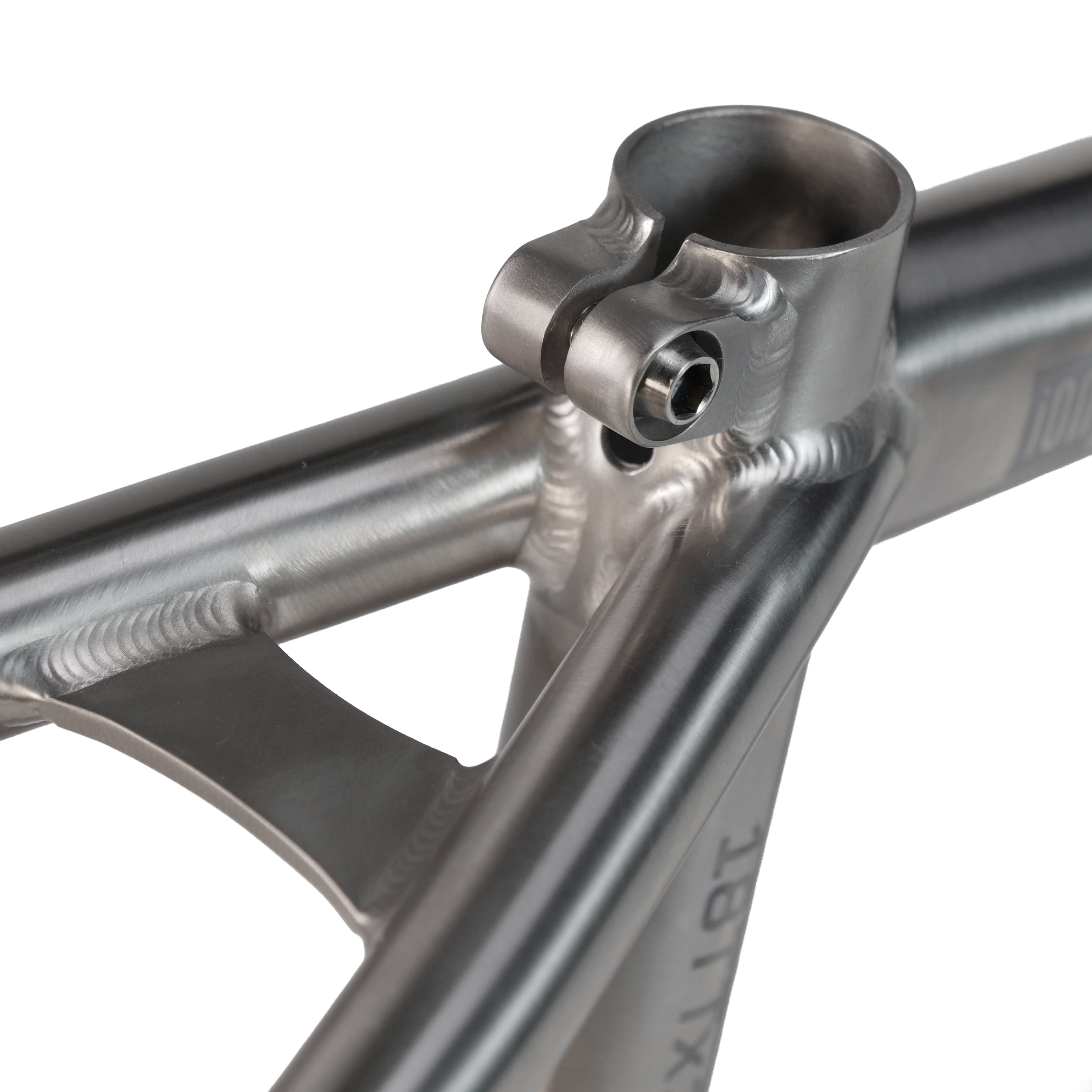 Close-up of the ION BMX Ti18 Titanium 18 Inch Frame seat clamp area, highlighting detailed welding and the seat post clamp bolt.