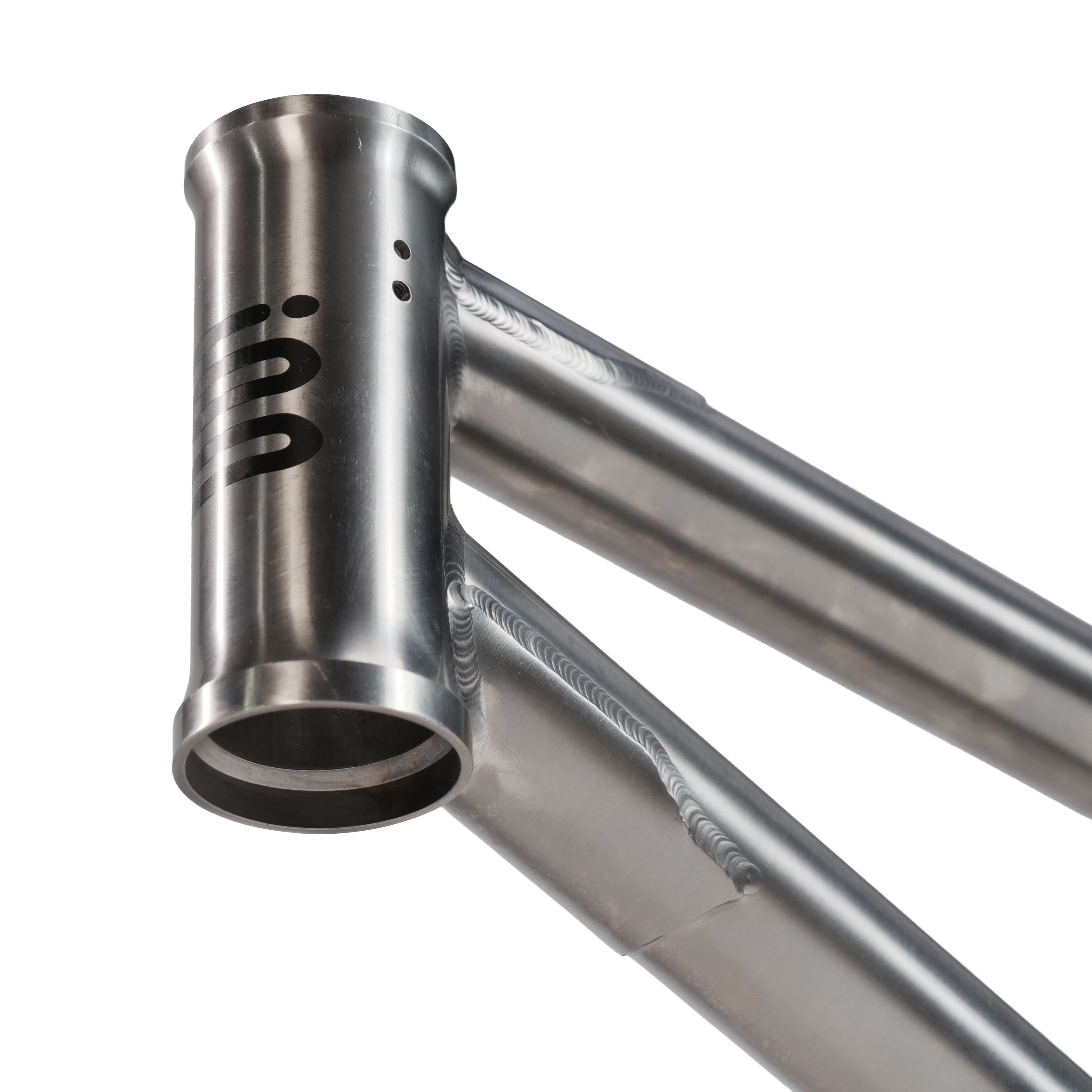 Close-up of the ION BMX Ti18 Titanium 18 Inch Frame head tube featuring precision welds and a minimalist front-etched logo.