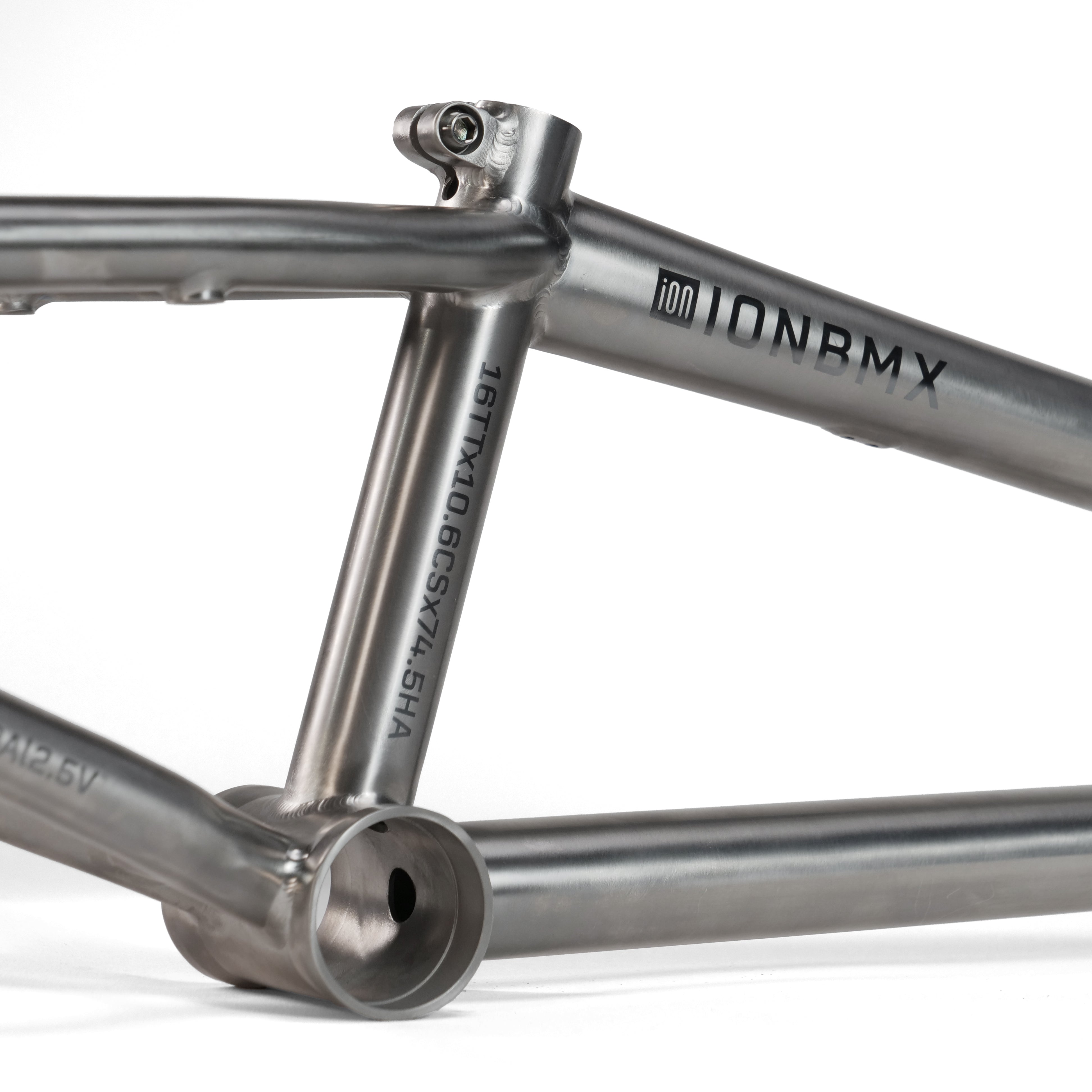 Close-up of the ION BMX Ti16 Titanium 16 Inch Frame, featuring technical specs on the tubing—showcasing a lightweight titanium BMX frame engineered for high youth performance.