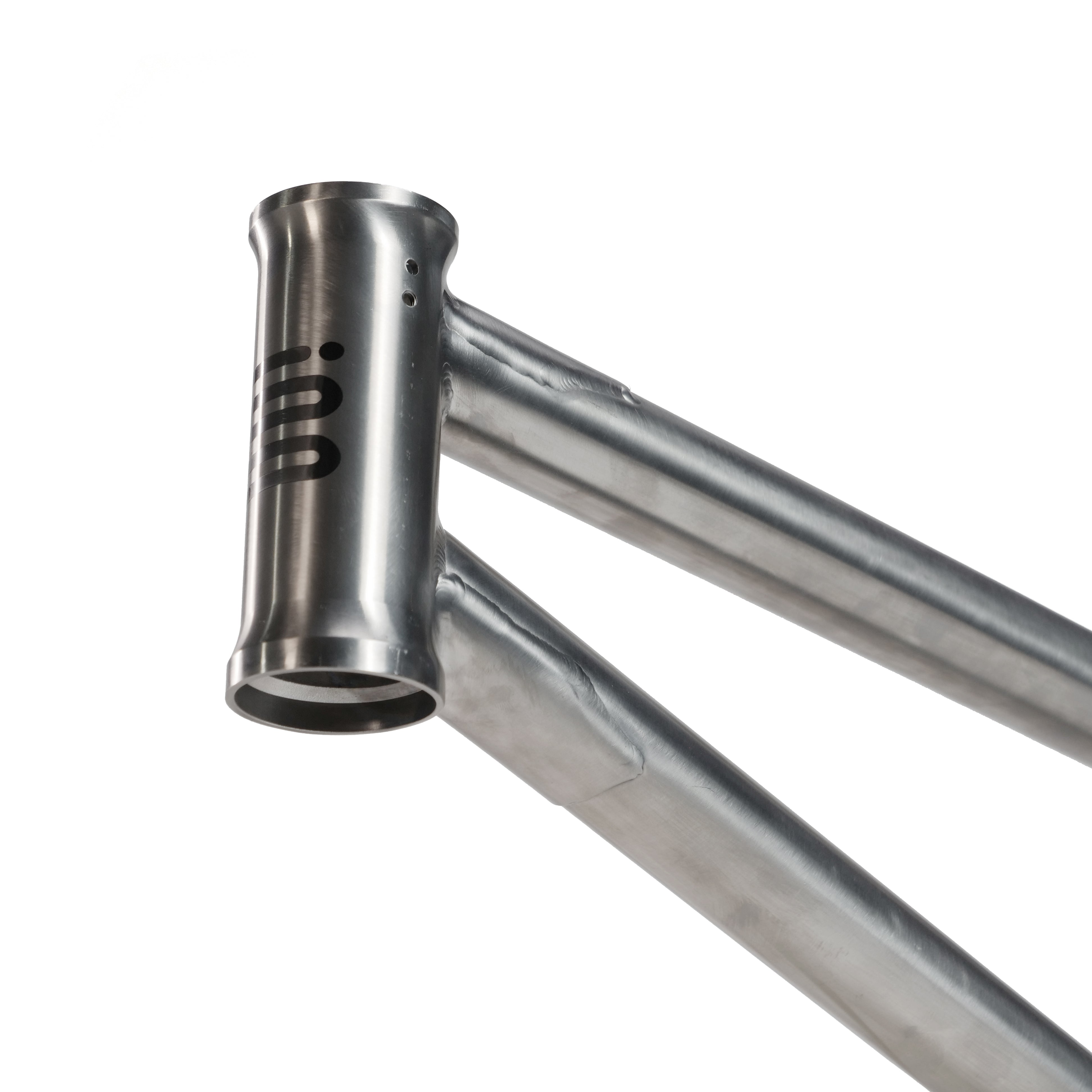 Close-up of the ION BMX Ti16 Titanium 16 Inch Frame’s head tube and top tubes, showcasing its brushed metal finish, small logo, and sleek titanium design for a lightweight, high-performance BMX bike.