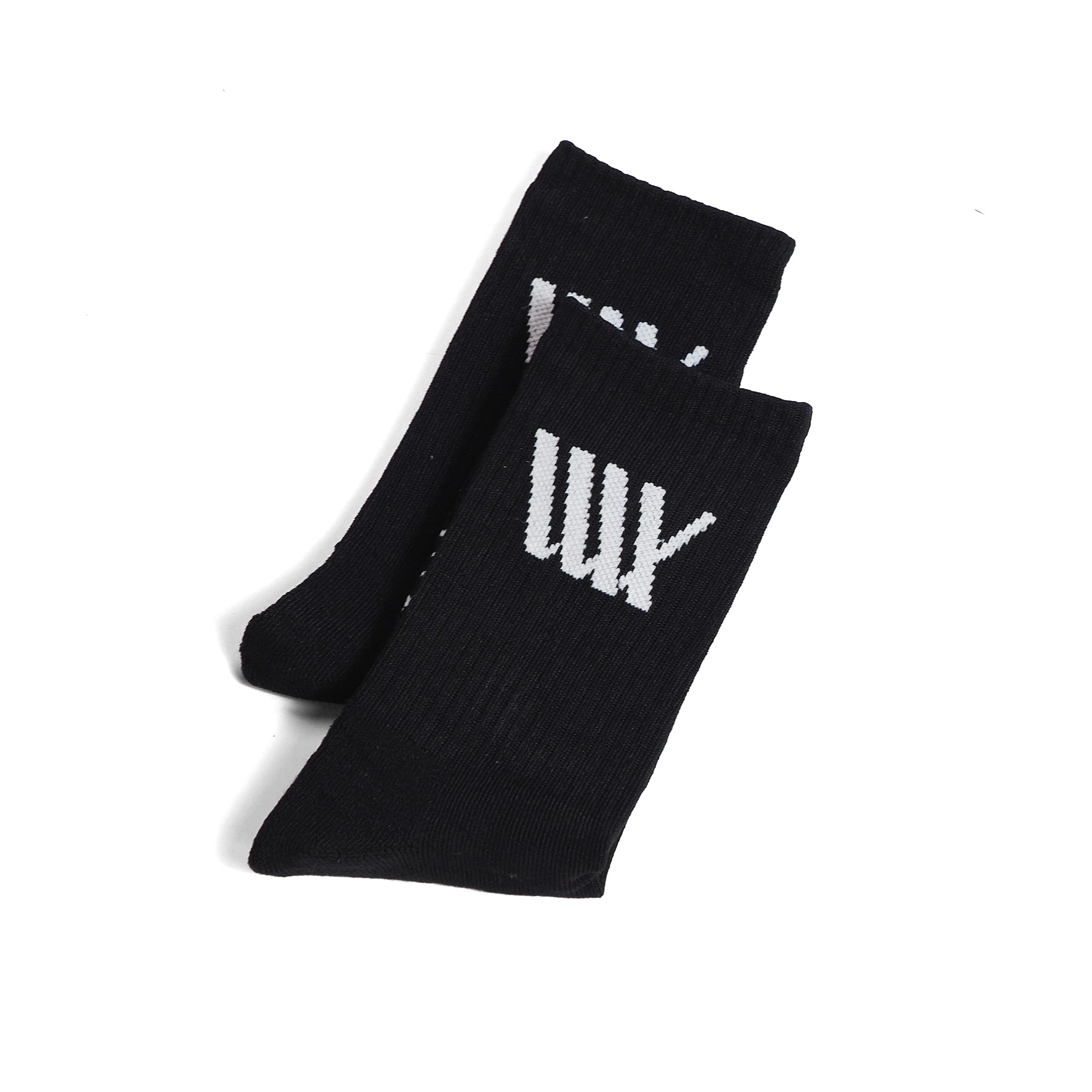 A pair of LUXBMX Crew Socks in black with a white tally mark design, displayed overlapping on a plain white background.