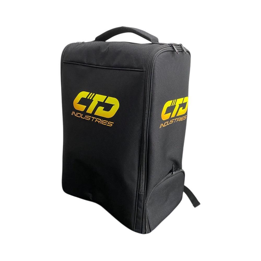 A black CTD Kit Bag with a handle and zippered compartments, featuring the yellow CTD Industries logo on the front and side.