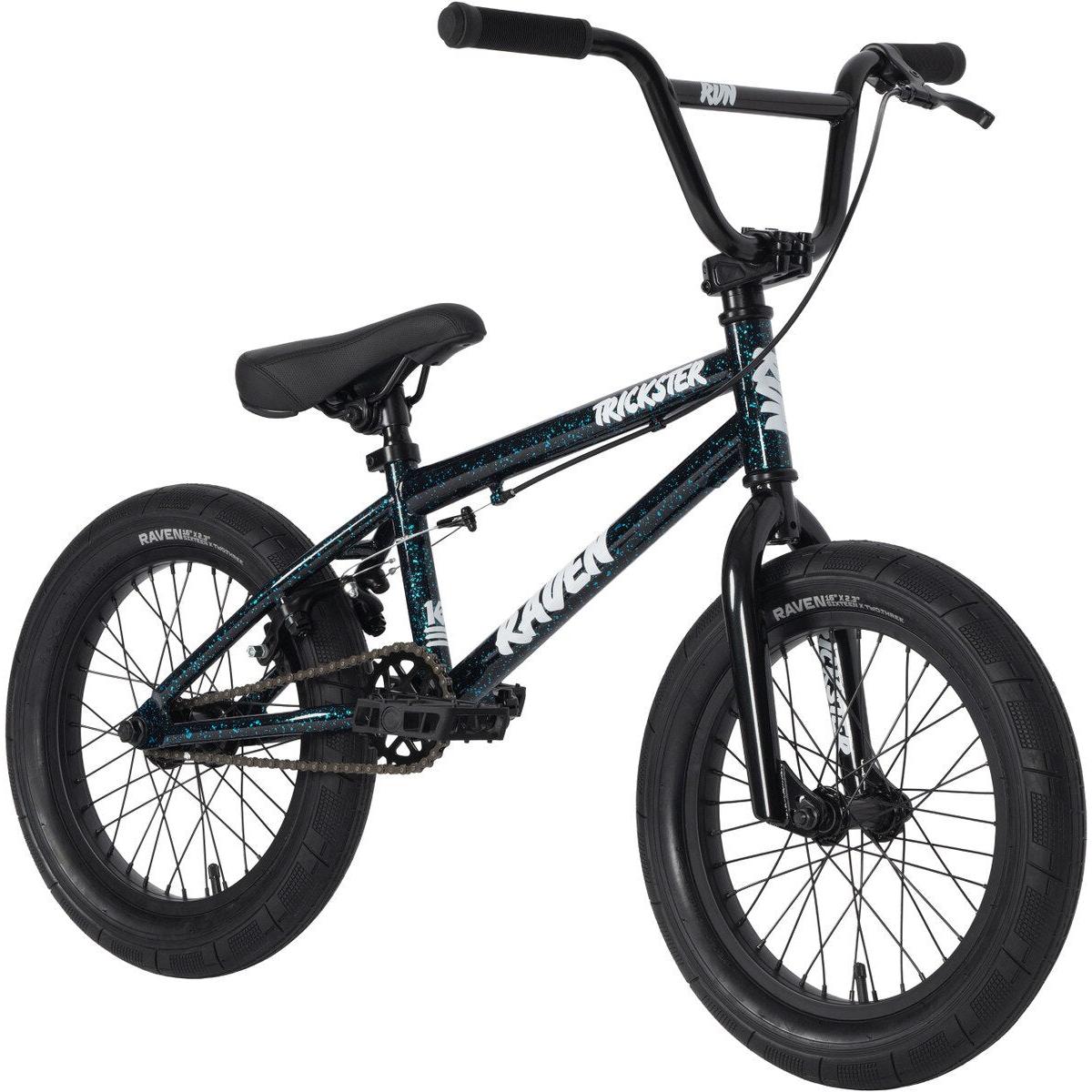The Raven Trickster 16 Inch Bike is black, features thick tires, a padded seat, sealed bearings, and displays the "Raven" brand and "Trickster" model on its frame.