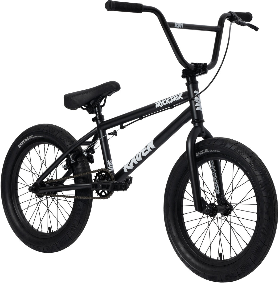 The Raven Trickster 18 Inch Bike is black, has thick tires, chromoly cranks, rear wheel pegs, and features "Trickster" and "Raven" on the frame.