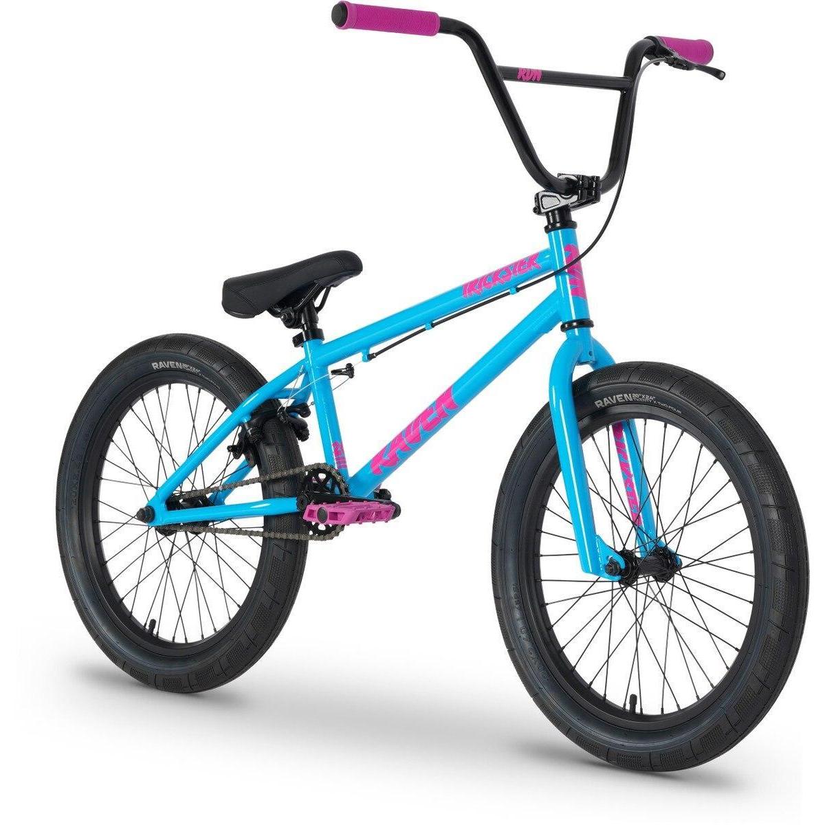 The Raven Trickster 20 Inch Bike, an entry-level BMX in blue with pink grips, pedals, decals, black tires, and a black saddle, is displayed on a white background.