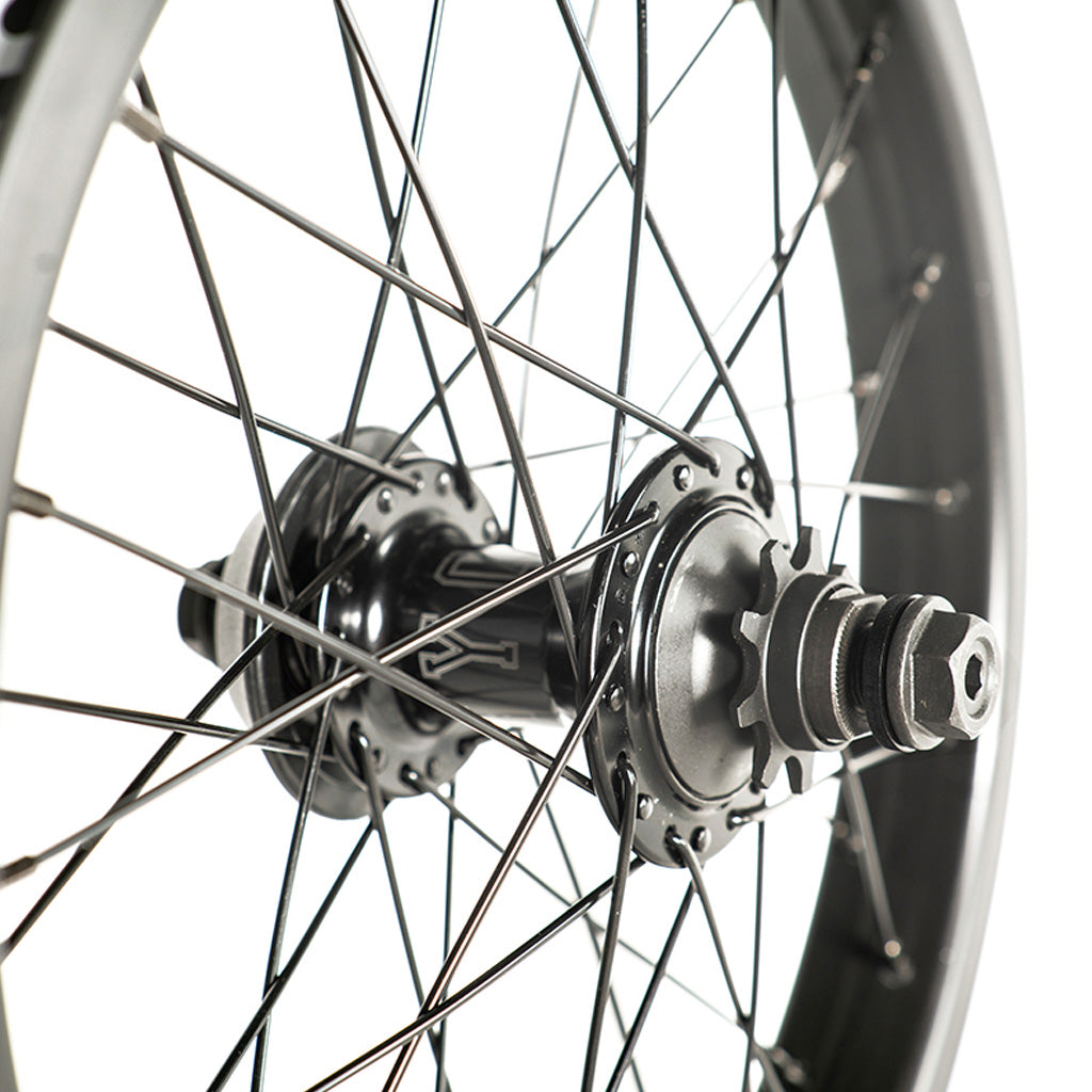 A close up of a Colony Pintour 18 Inch Rear Wheel with spokes.