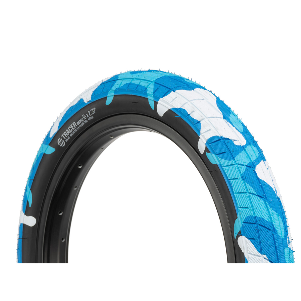A blue and white Salt Tracer Tyre with a camouflage pattern for bmx traction.