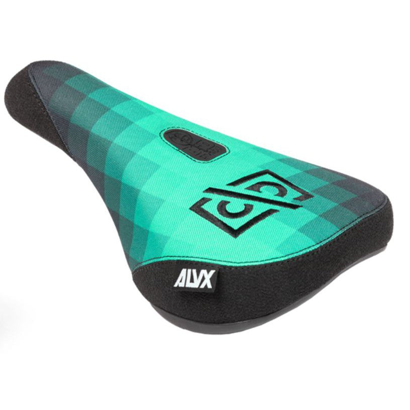 A green and black BSD Alvx Eject Pivotal Seat with the word xyla embroidered tape logo on it.
