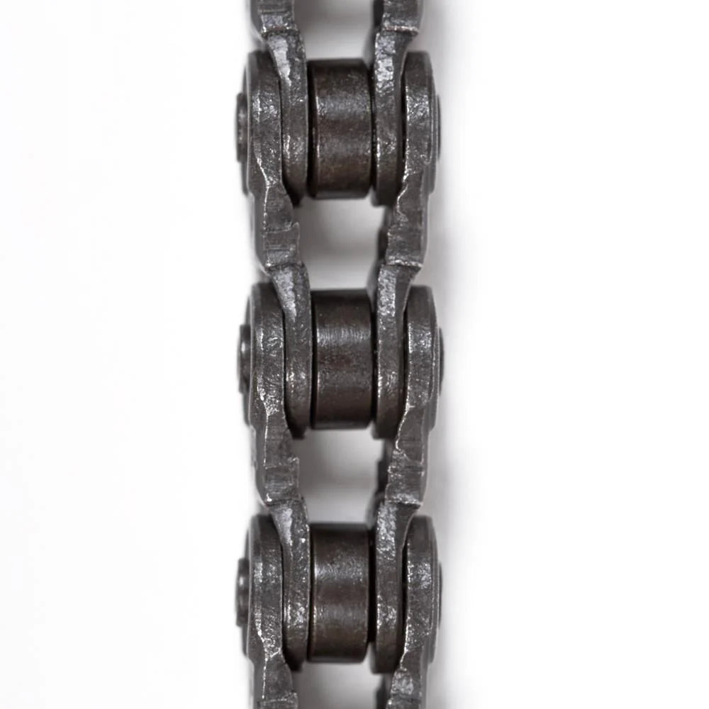 Close-up view of the Shadow Conspiracy Supreme Chain BMX chain, with visible links and rollers, arranged vertically against a white background.