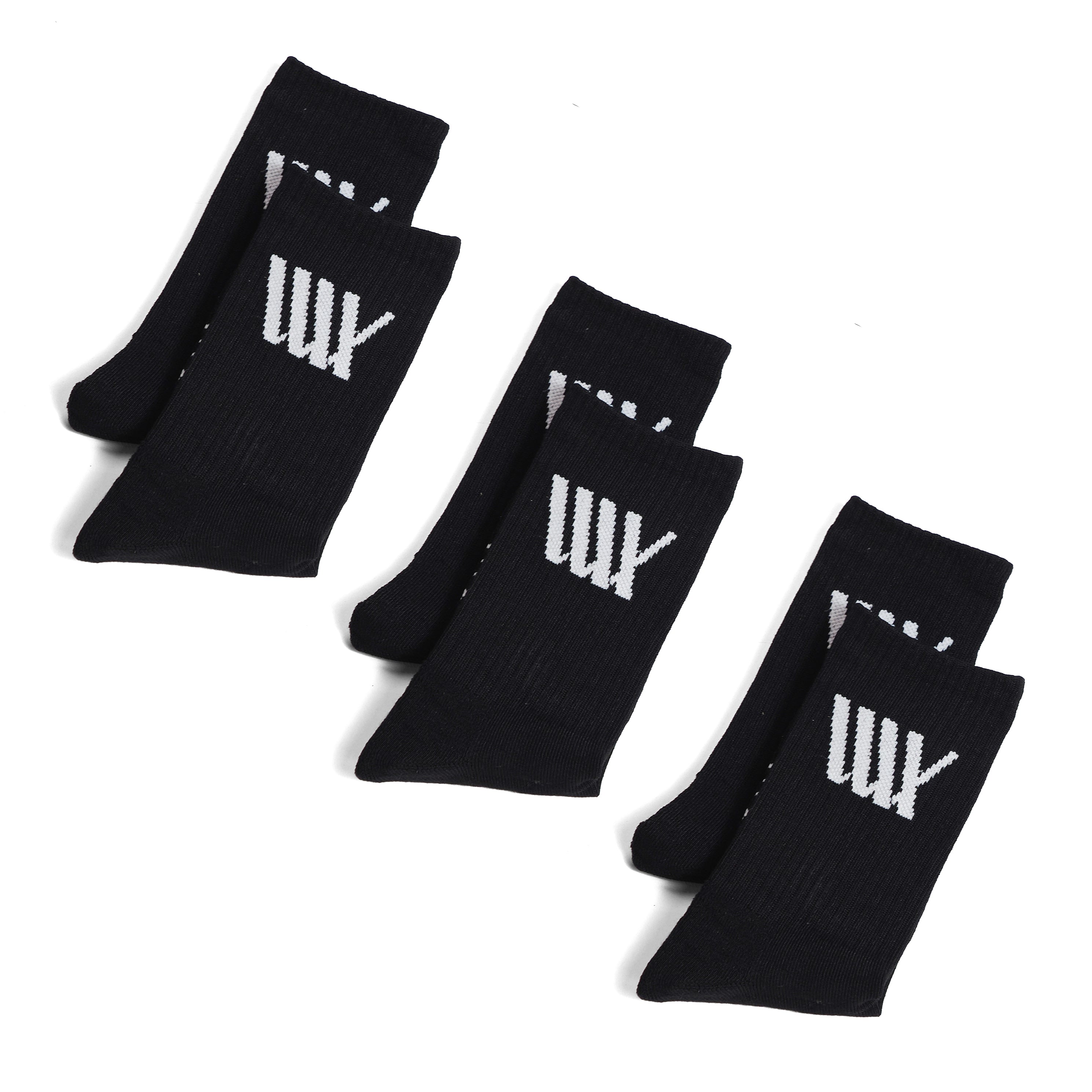 Three pairs of LUXBMX Crew Socks (3 pack) in black cotton with white "W" and "Y" designs are displayed on a white background, ideal for BMX riders.