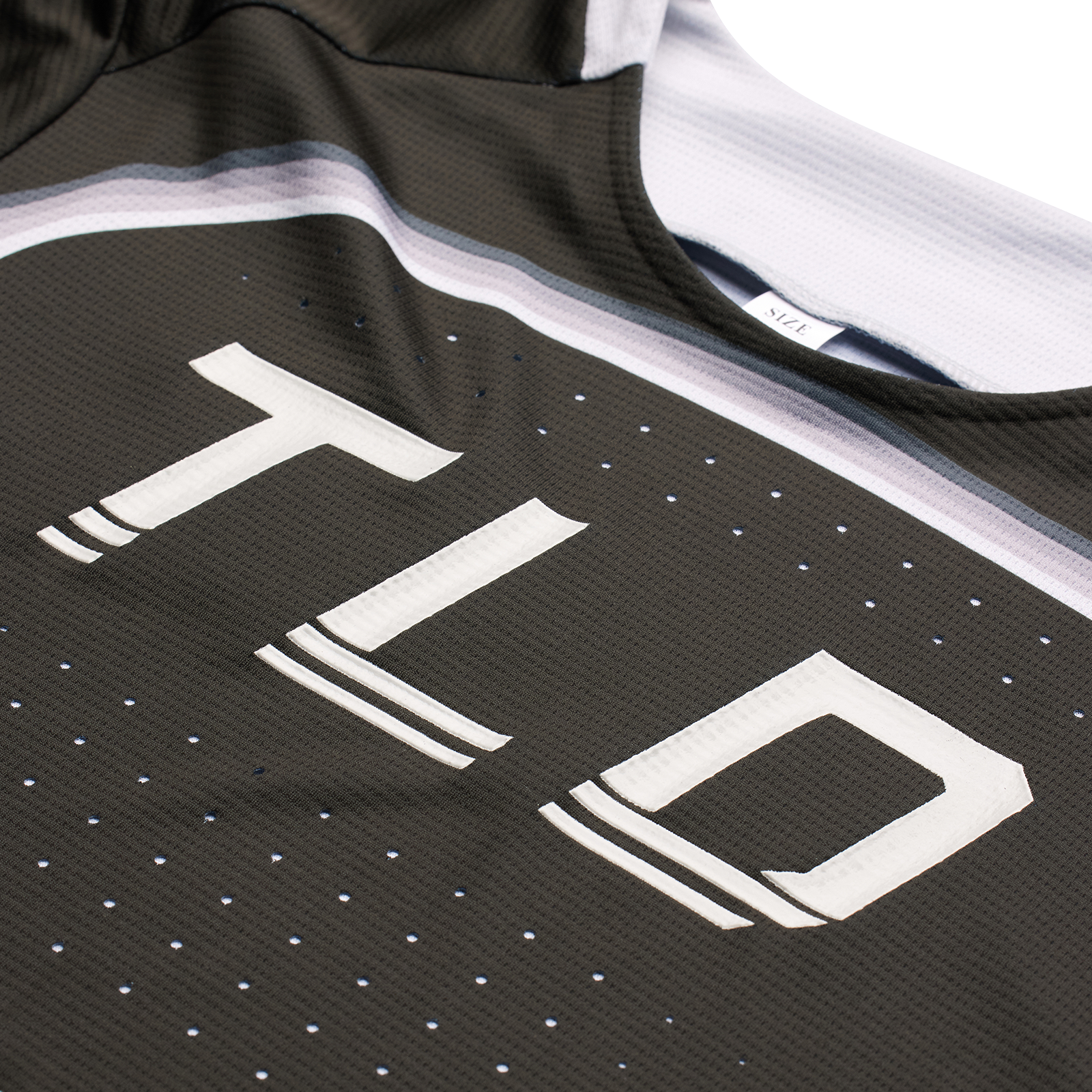 Close-up of a TLD Youth Sprint Jersey Reverb Black with the number 10.