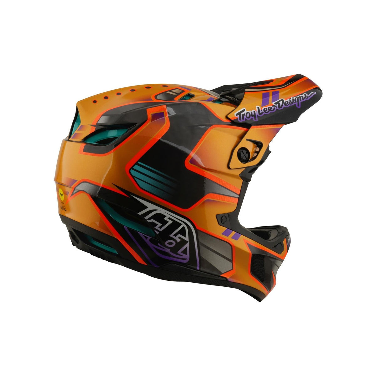 The TLD 26.1 D4 AS Carbon Helmet / Crest Gold is a full-face motocross helmet with a Crest Gold geometric design, Troy Lee Designs logo on the side, and advanced Mips protection for enhanced safety.